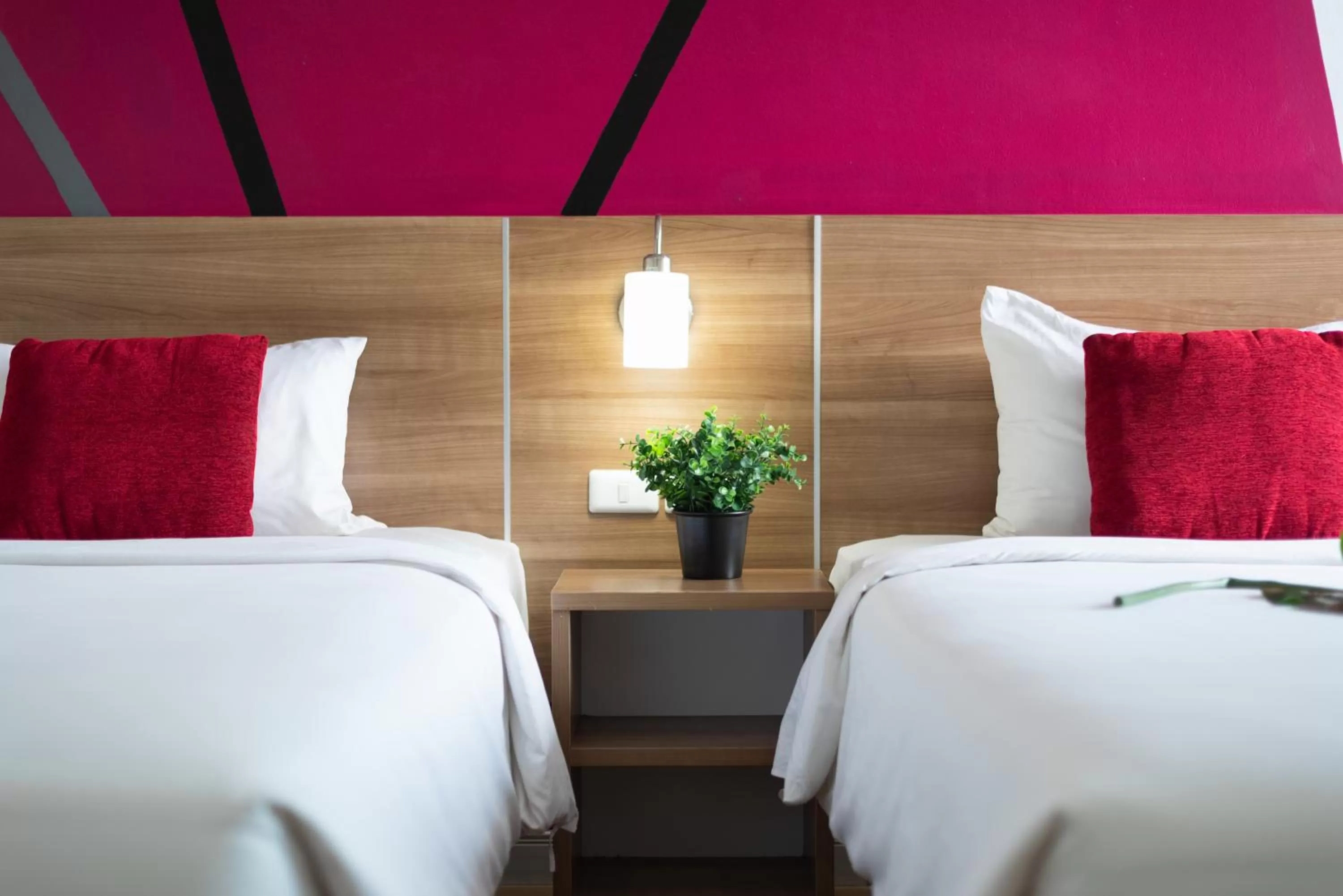 Bed in Eco Inn Lite Chanthaburi