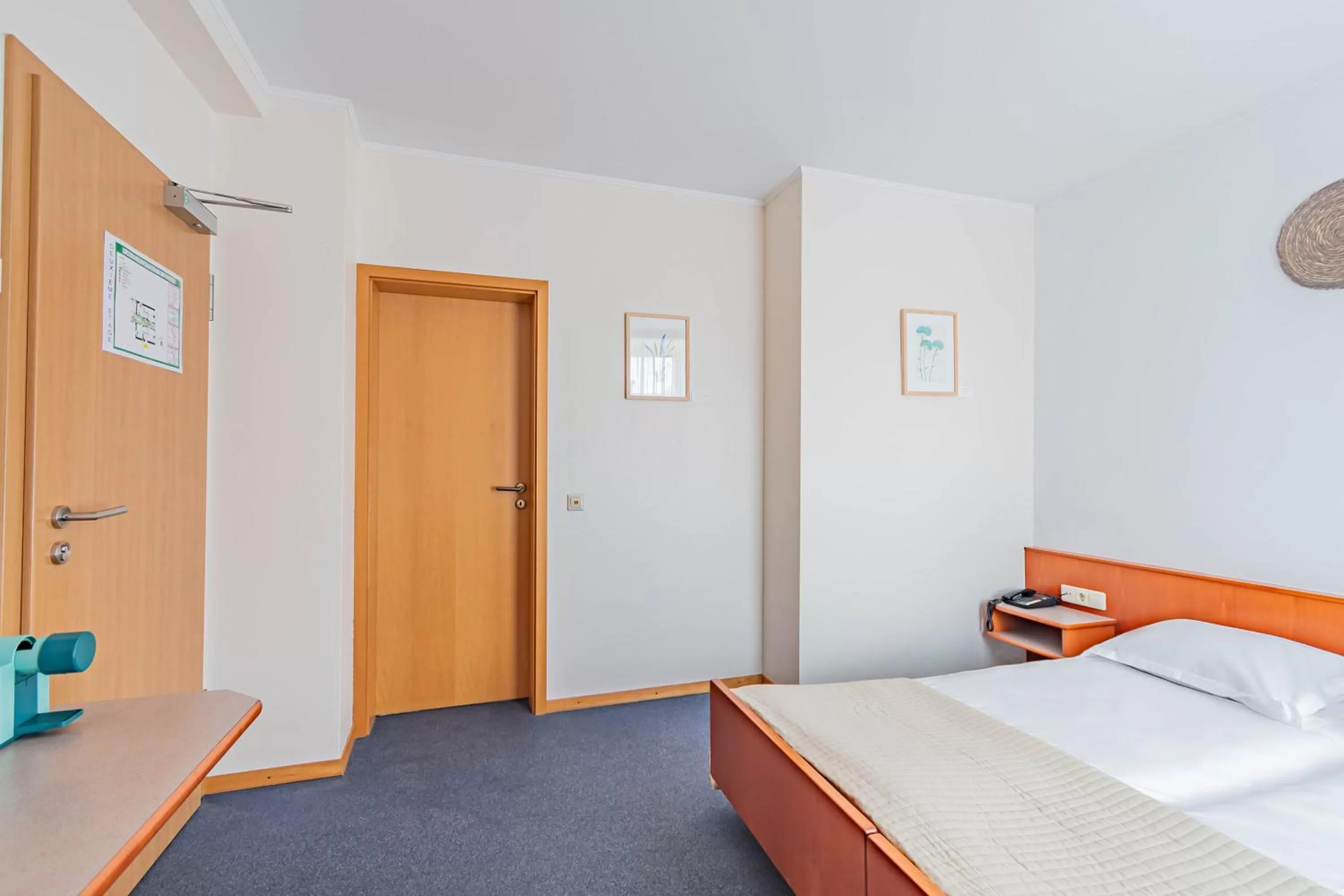 Bed in Hôtel Le Petit Poète