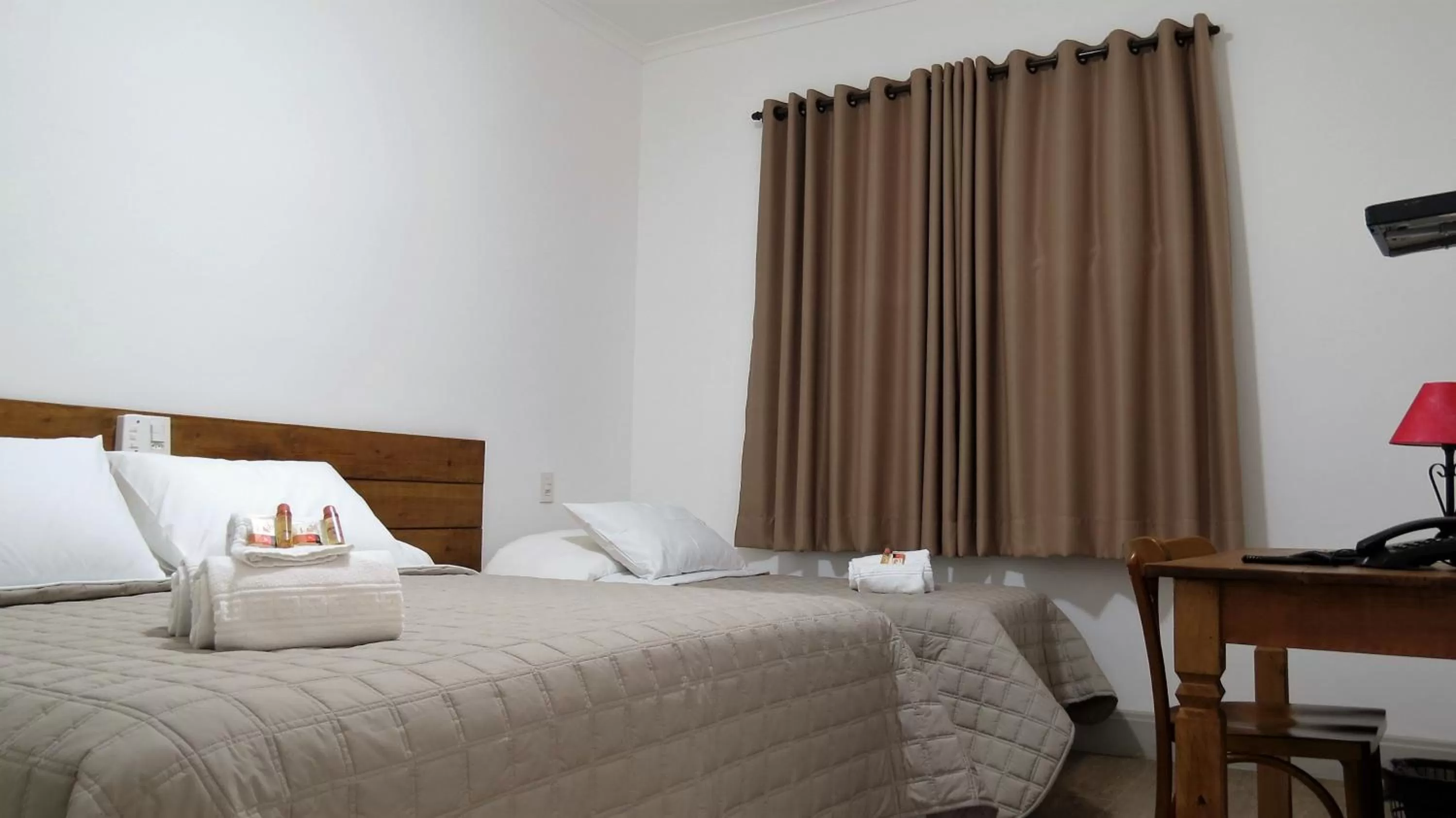 Bed in Pousada Sagrados Corações