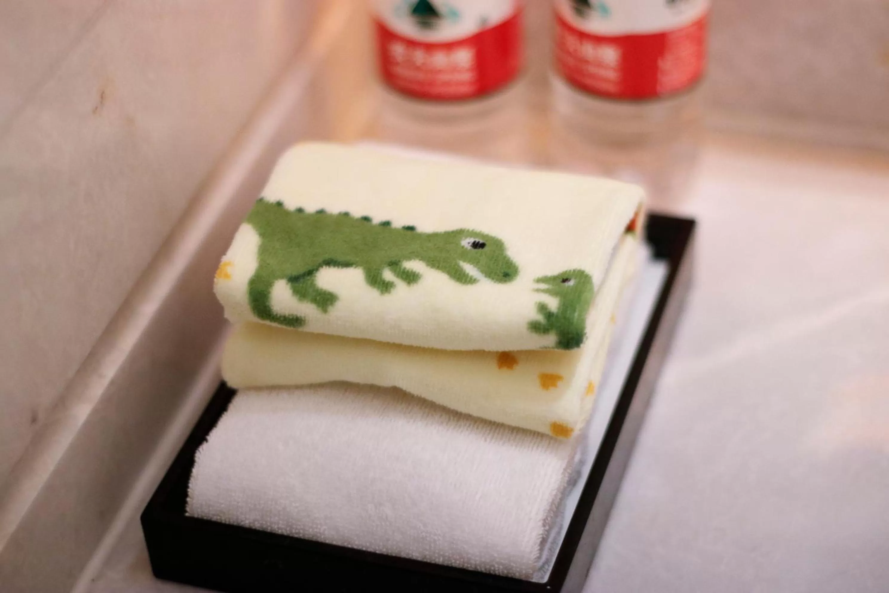 Bathroom in Wyndham Qingdao l Free Fixed-Time Shuttle Service Between Hotel and Airport & North Railway Station l Outdoor Children's Amusement Park l 1-Hour Play Snooker or Table Tennis