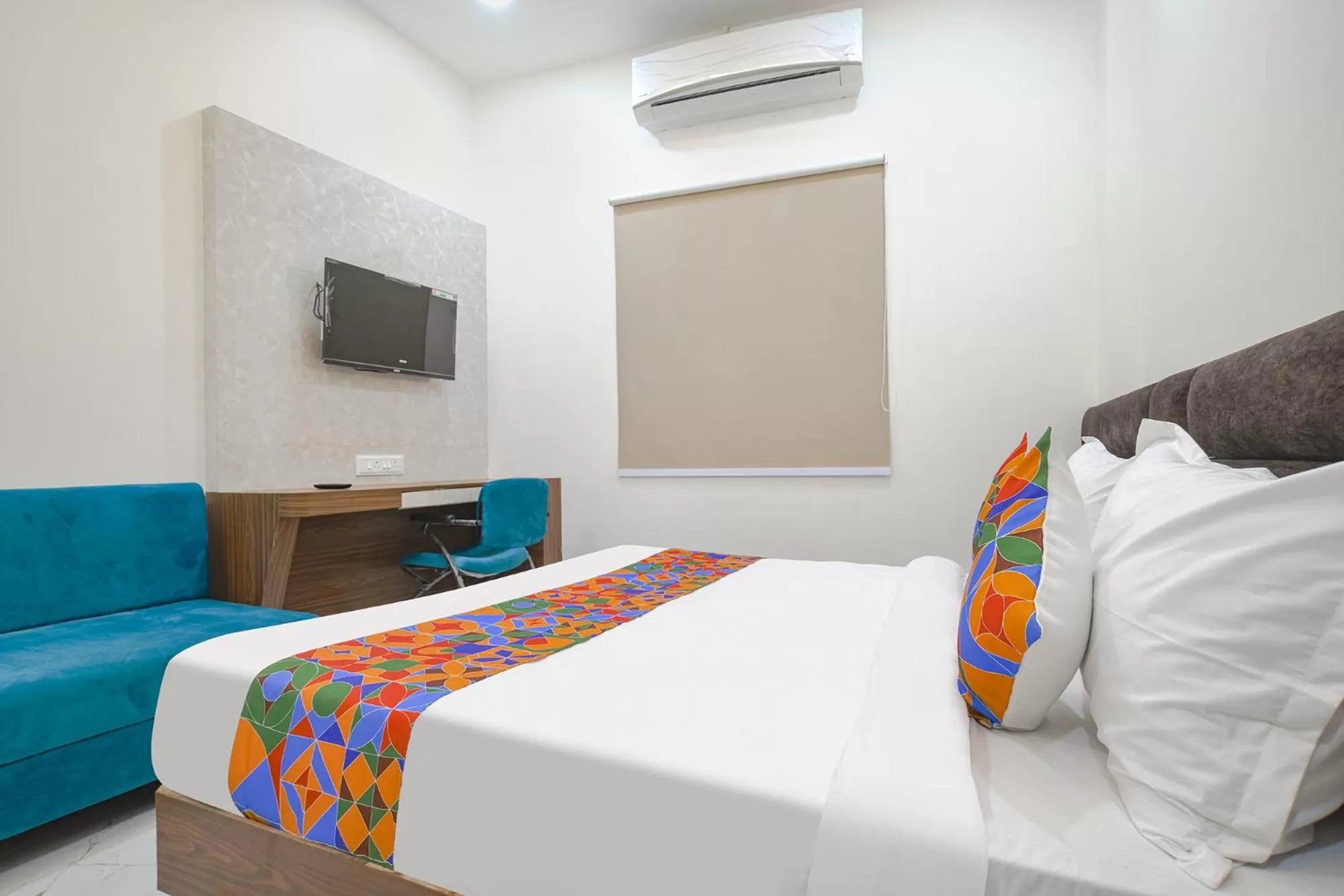 Bed in FabHotel Ramya