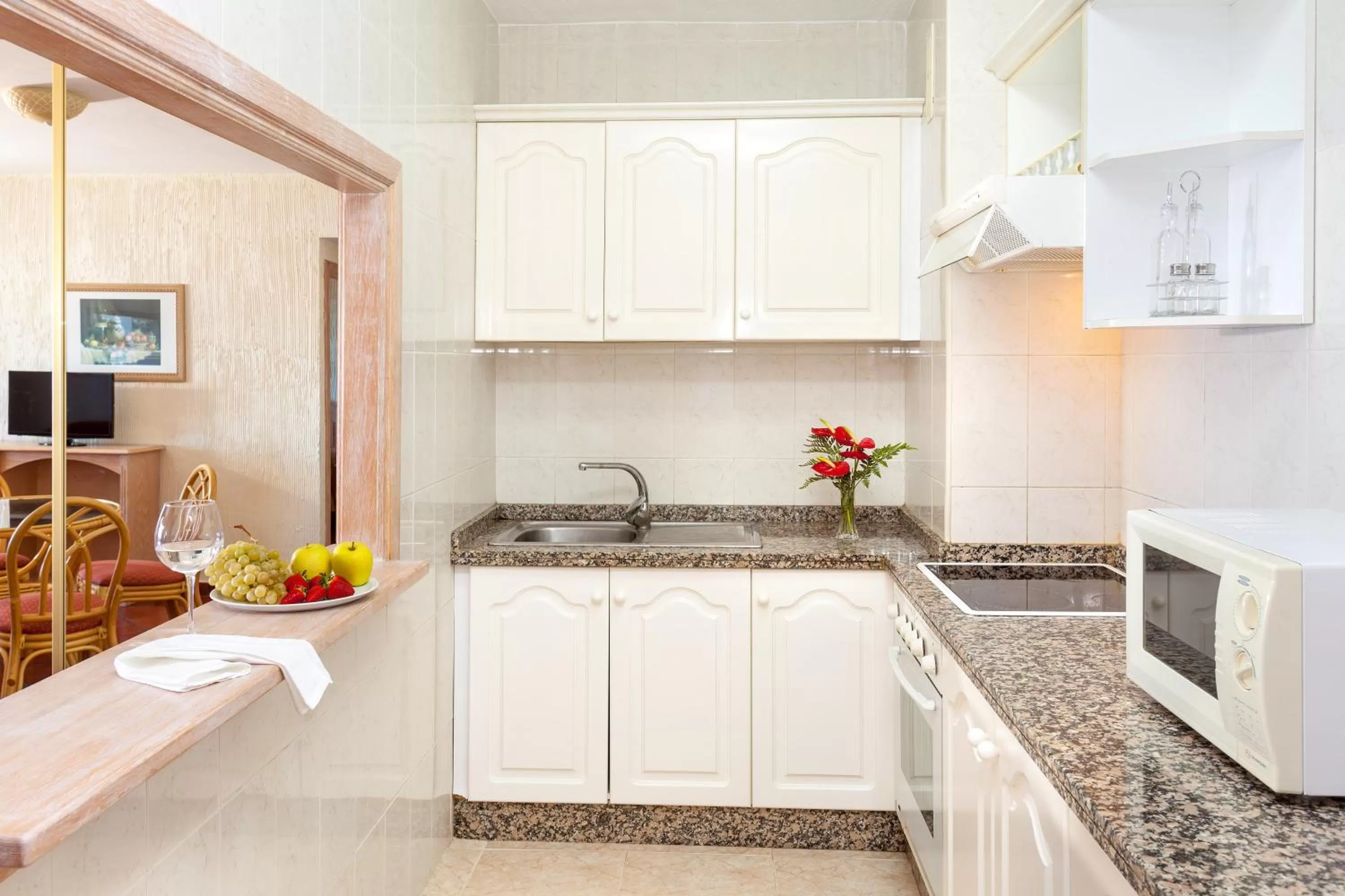 Kitchen or kitchenette in Apartamentos Masaru