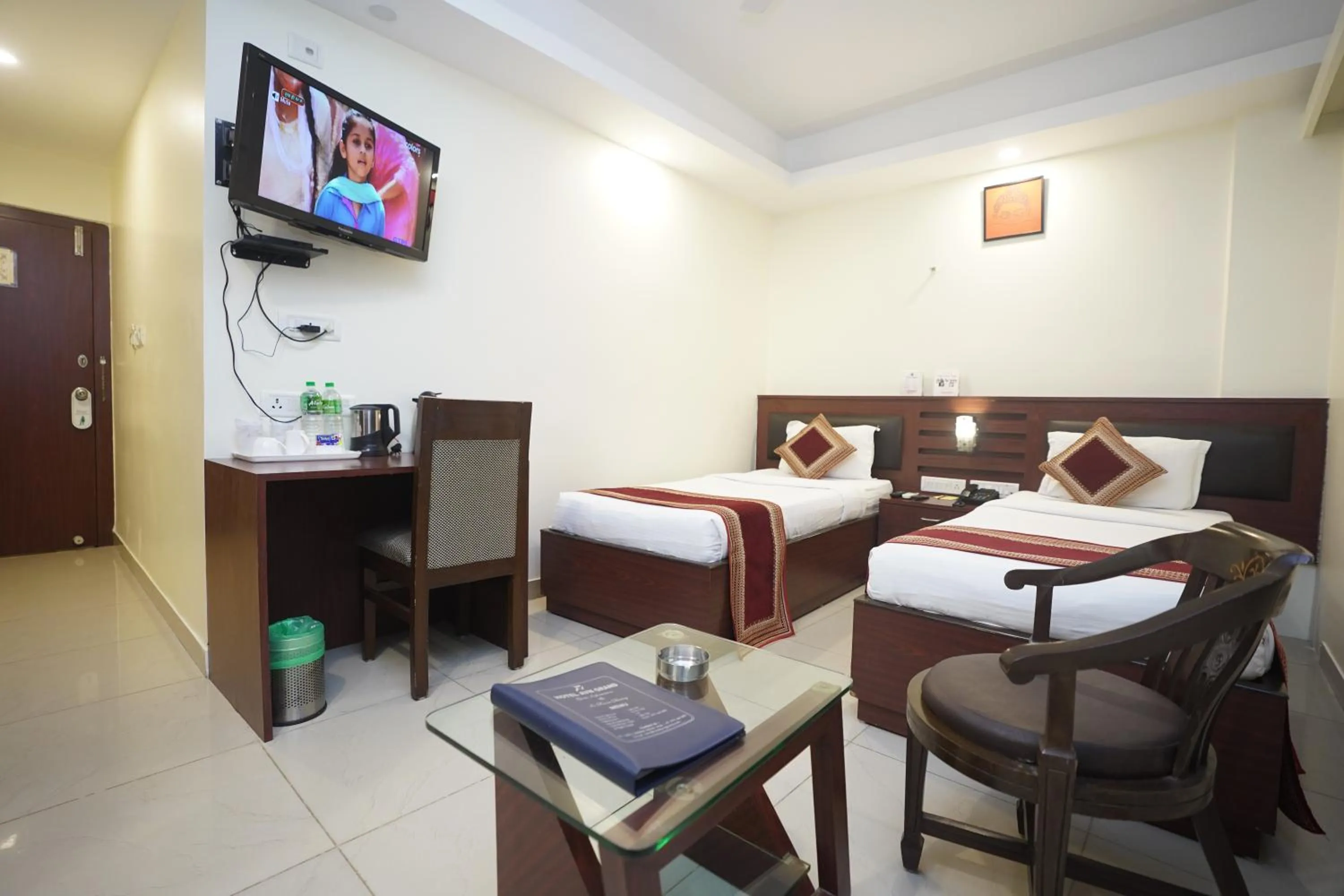 Bed in HOTEL AVN GRAND