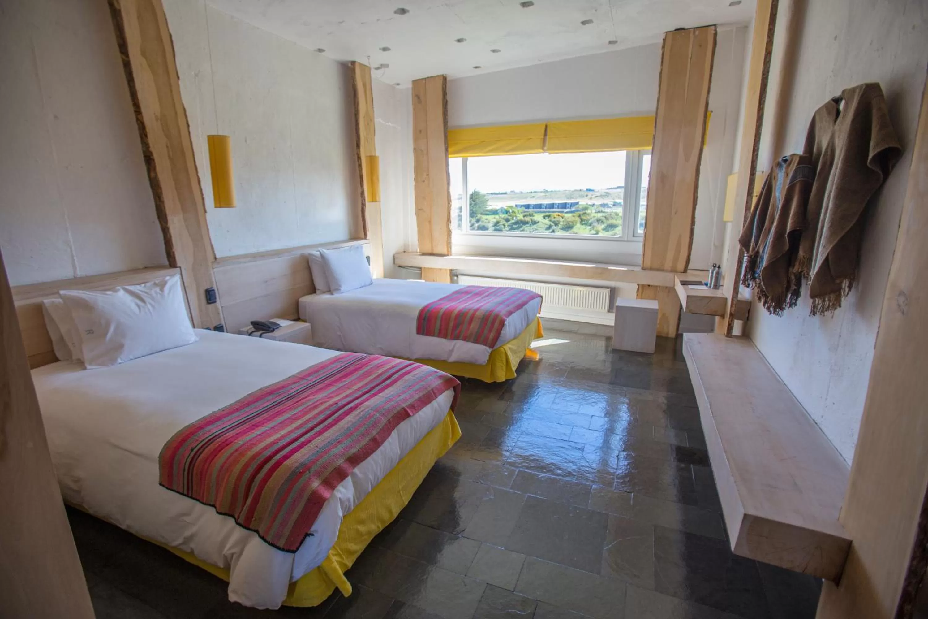 Bed in Remota Patagonia Lodge