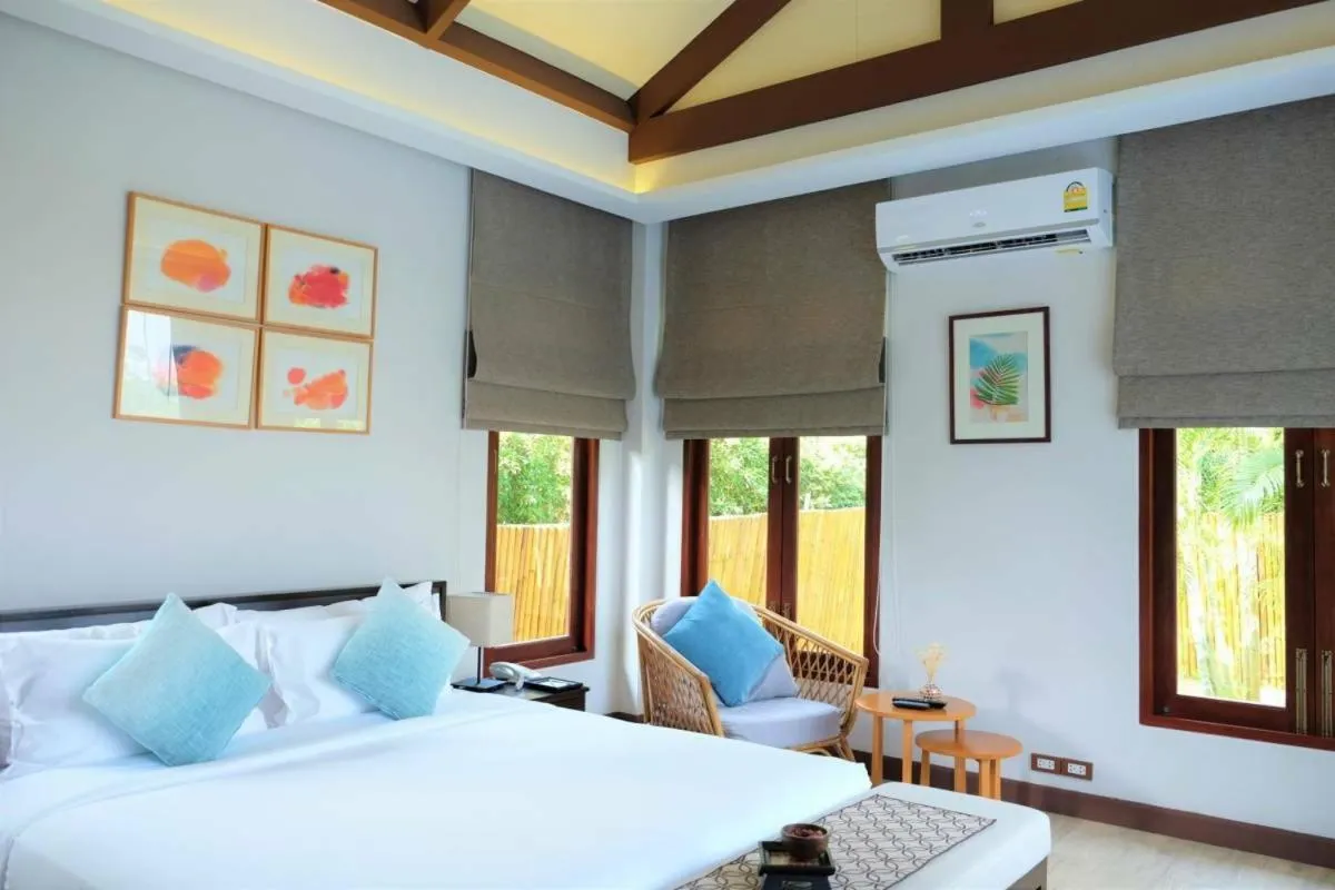 Bed in Triple Tree Beach Resort
