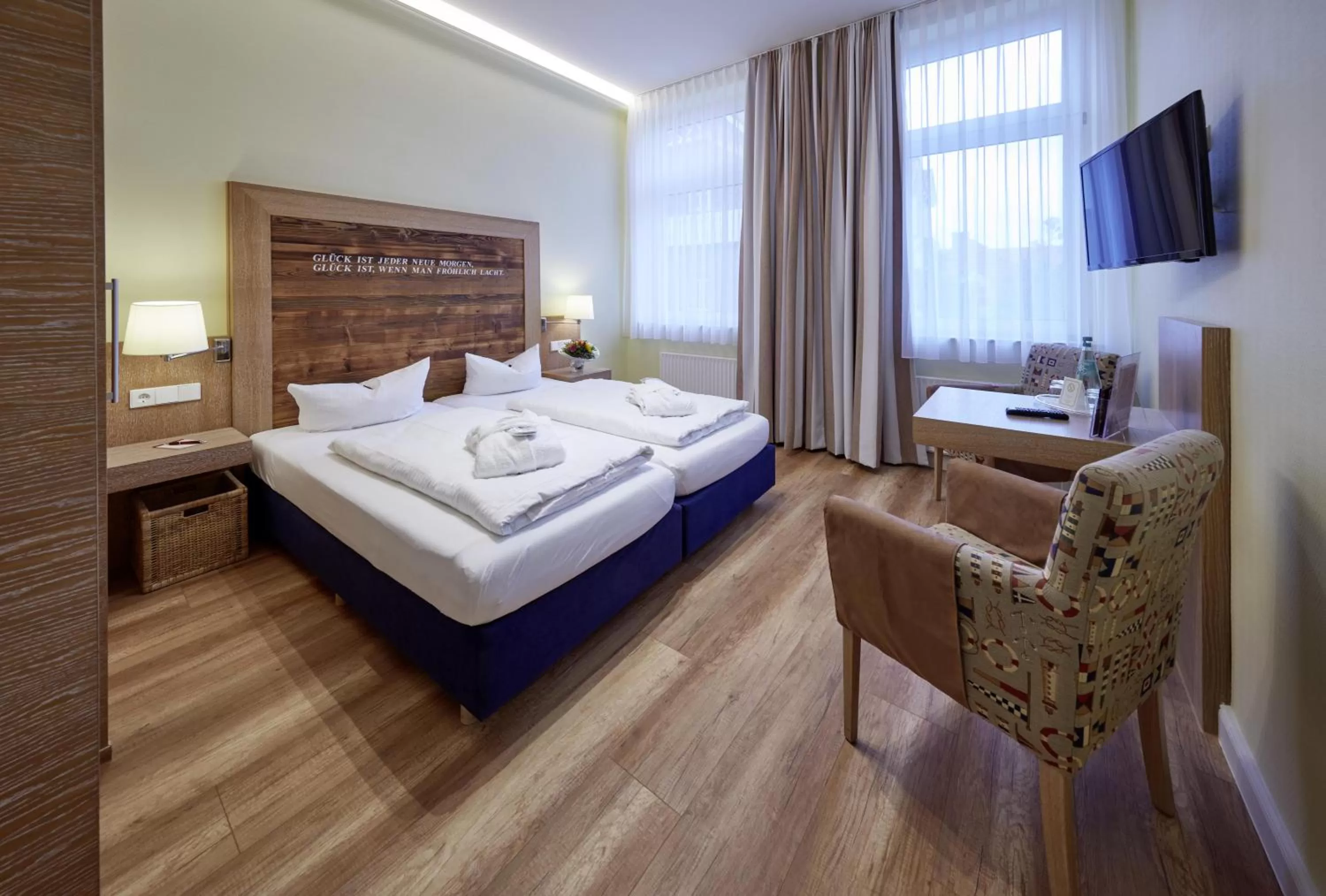 Photo of the whole room, Bed in Strandhotel VierJahresZeiten