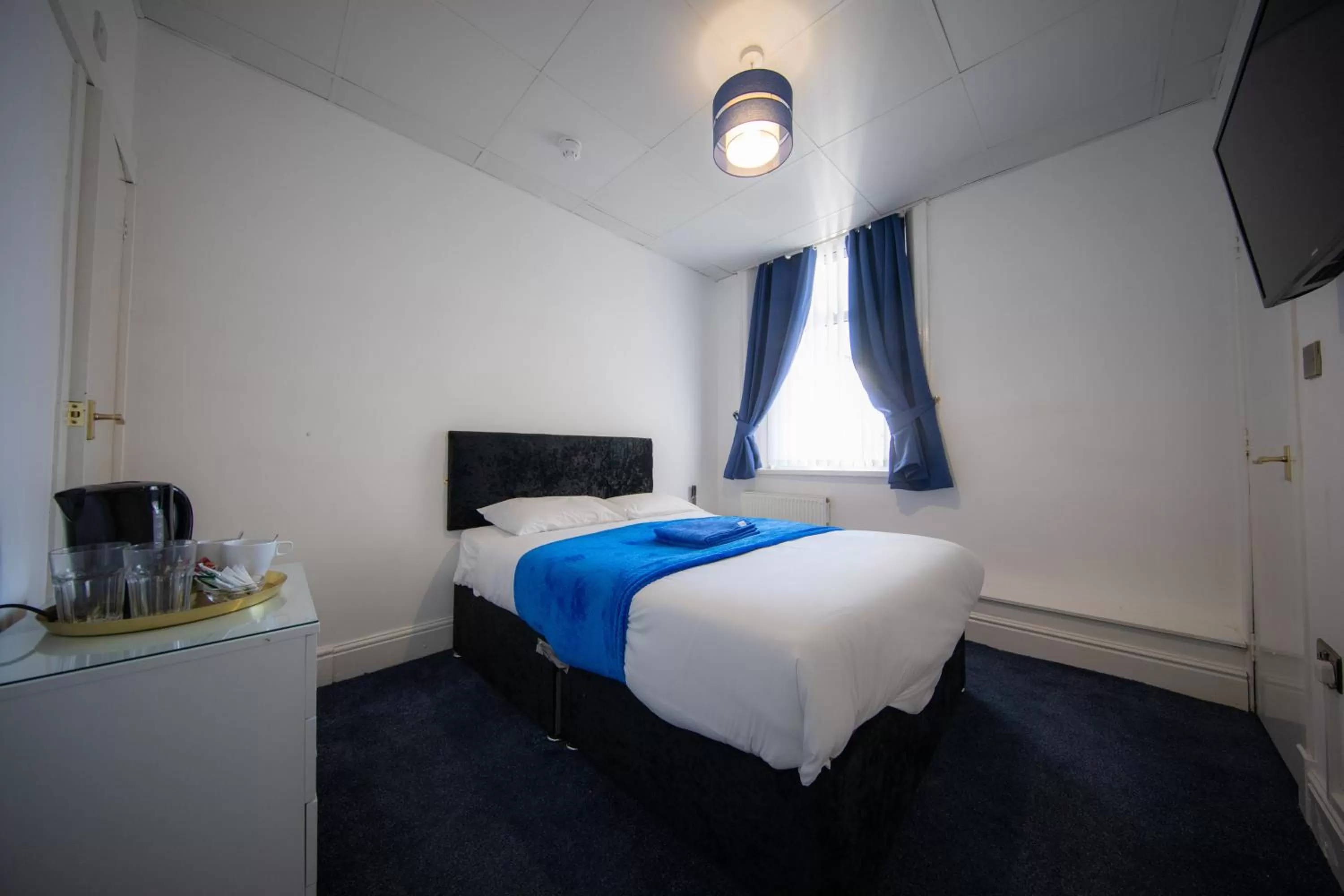 Bed in The Adonis Hotel