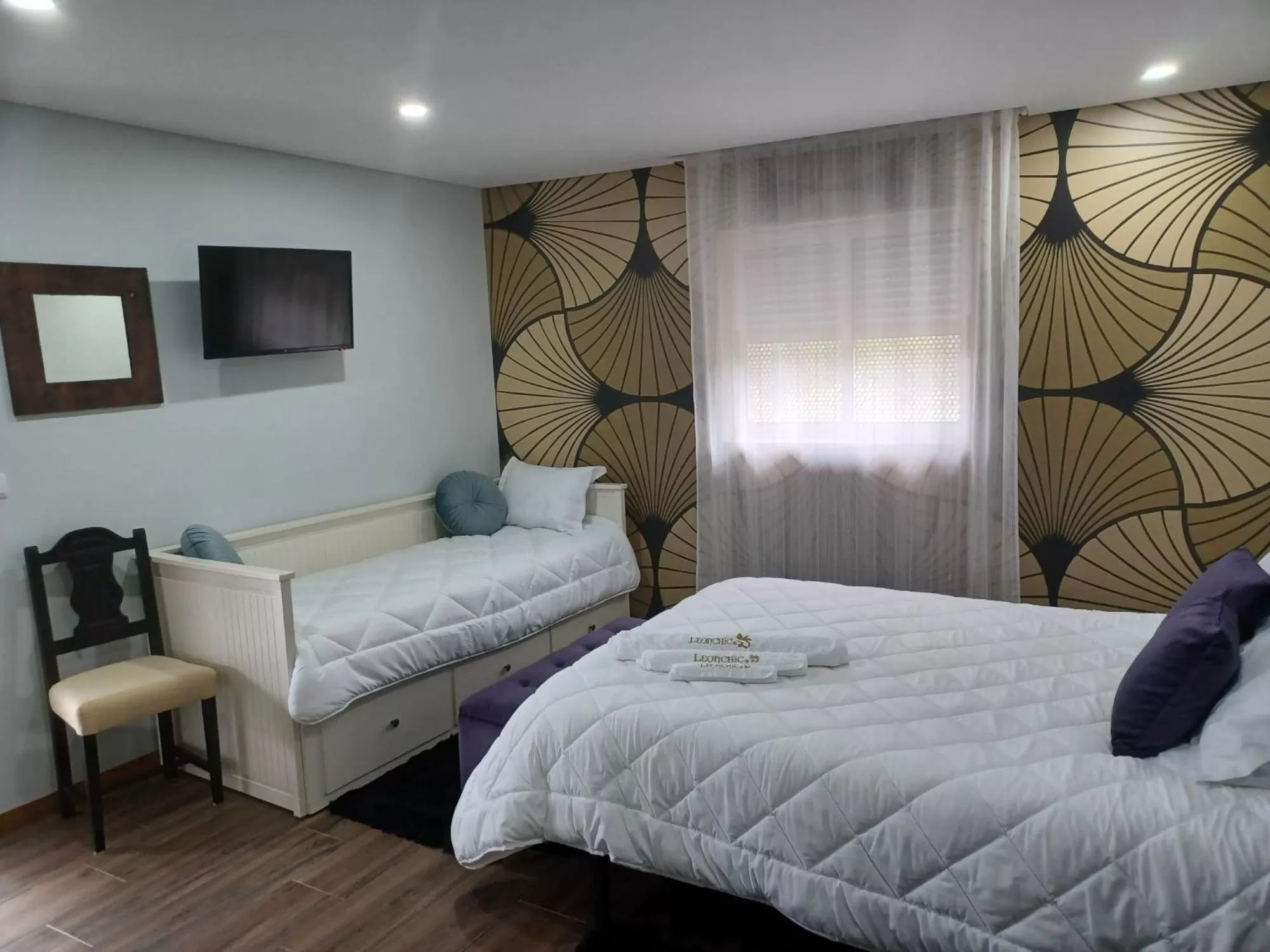 Bed in Leonchic - Guest House