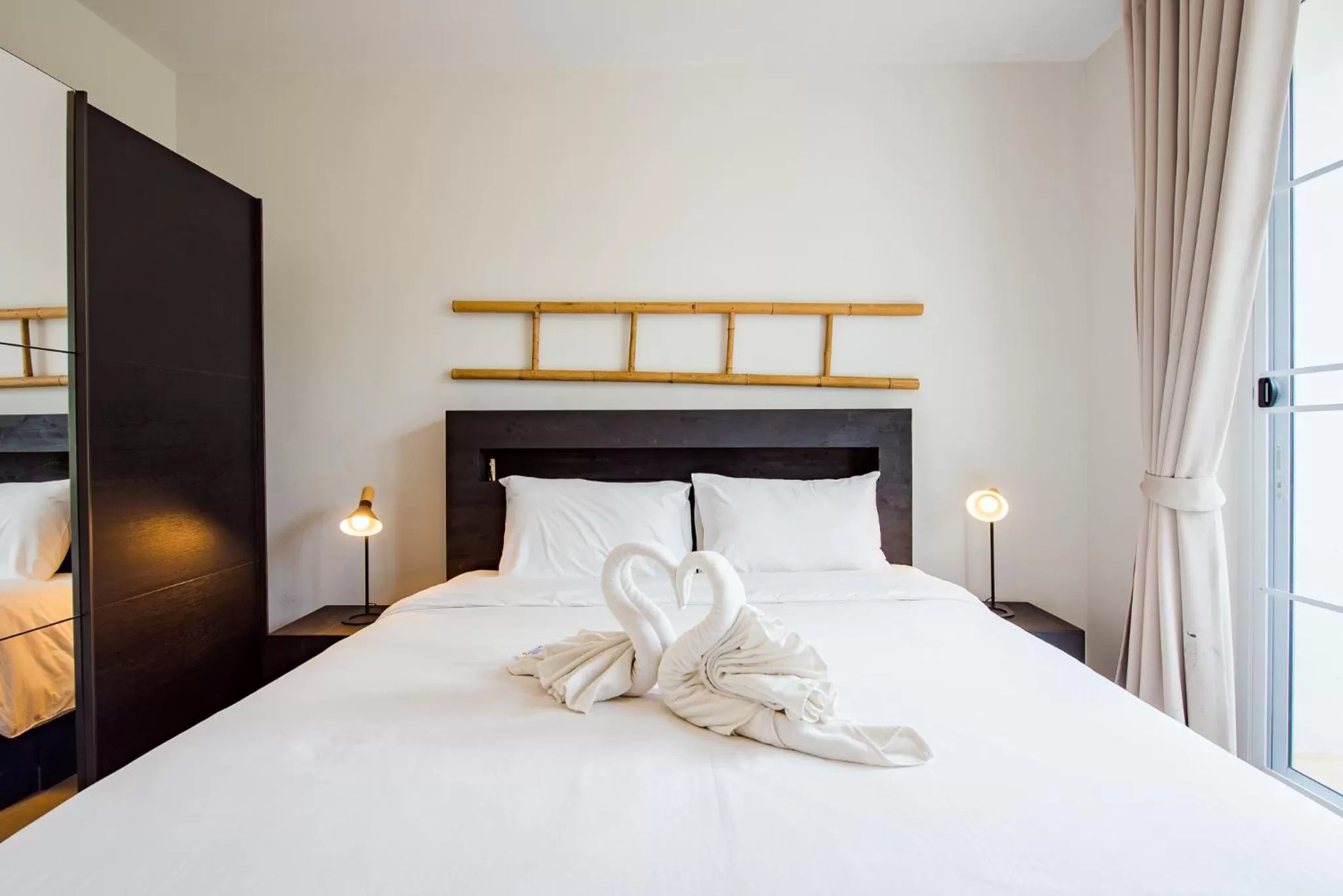 Bed in The Beach Village Resort