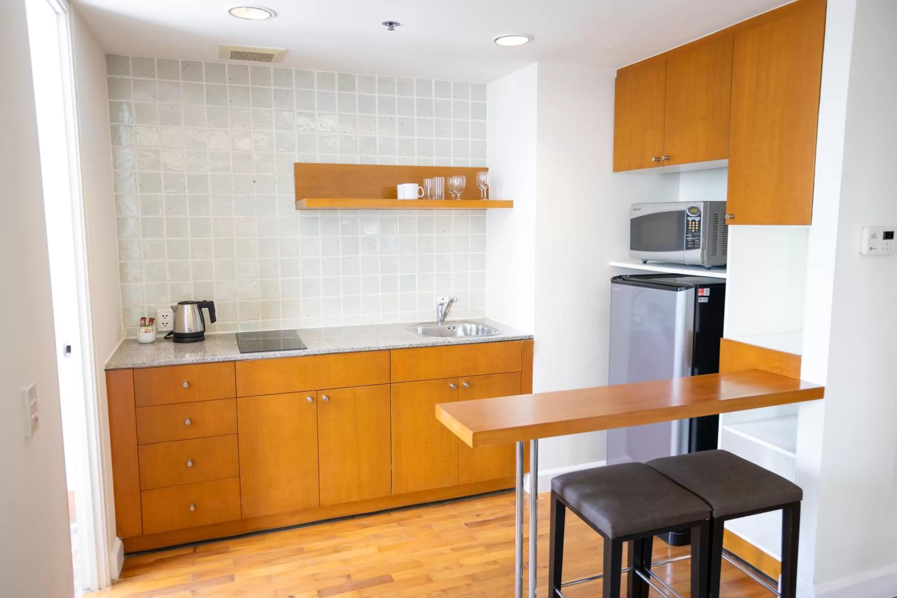 Kitchen or kitchenette in Chatrium Sathon Bangkok