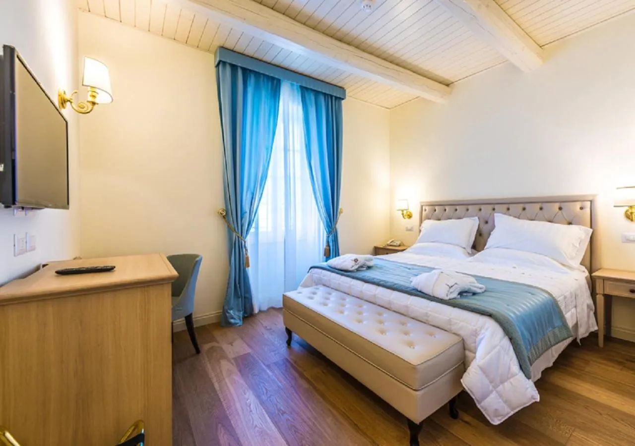 Bedroom, Bed in Relais Paradiso Resort & Spa