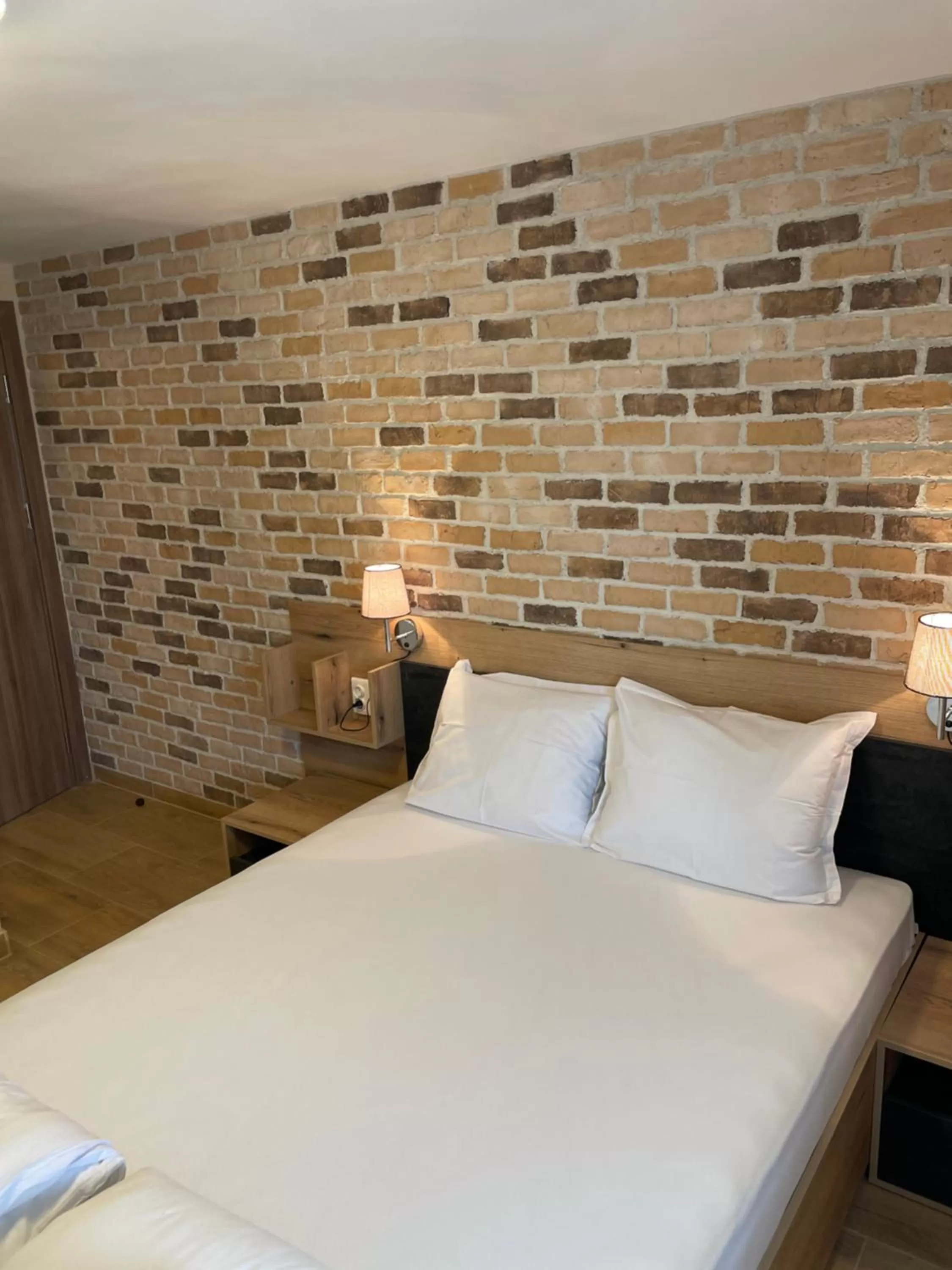 Bed in Family Hotel Malibu