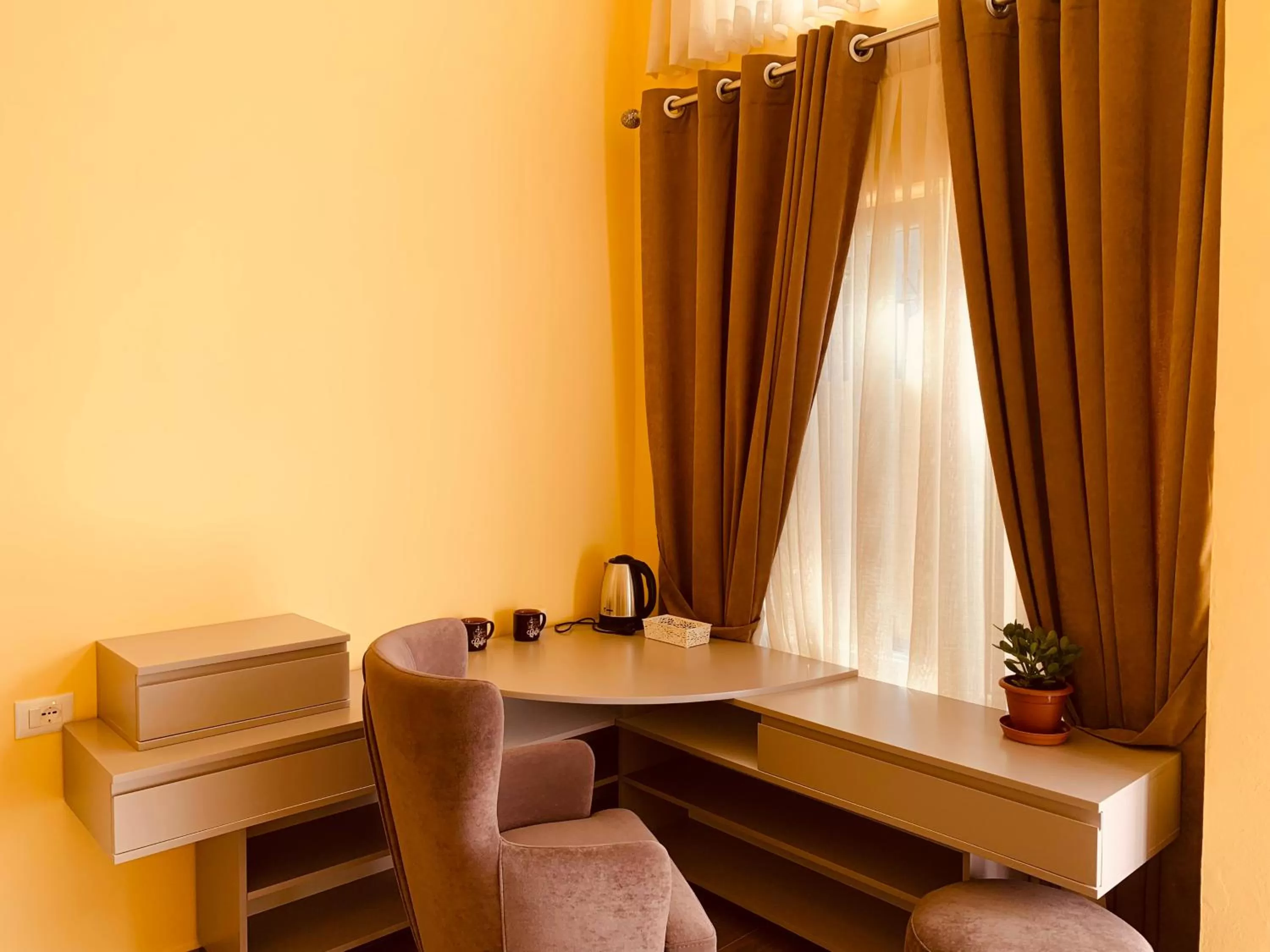 TV/Entertainment Center in Auto Tana Guest House