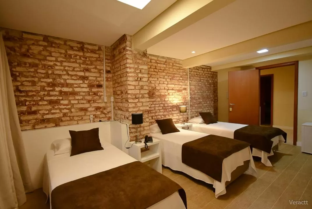 Photo of the whole room, Bed in Hotel Praça da Matriz