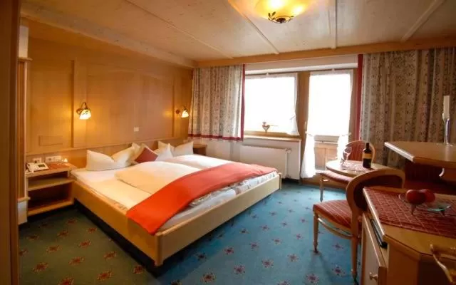 Photo of the whole room, Bed in Hotel Bergkristall