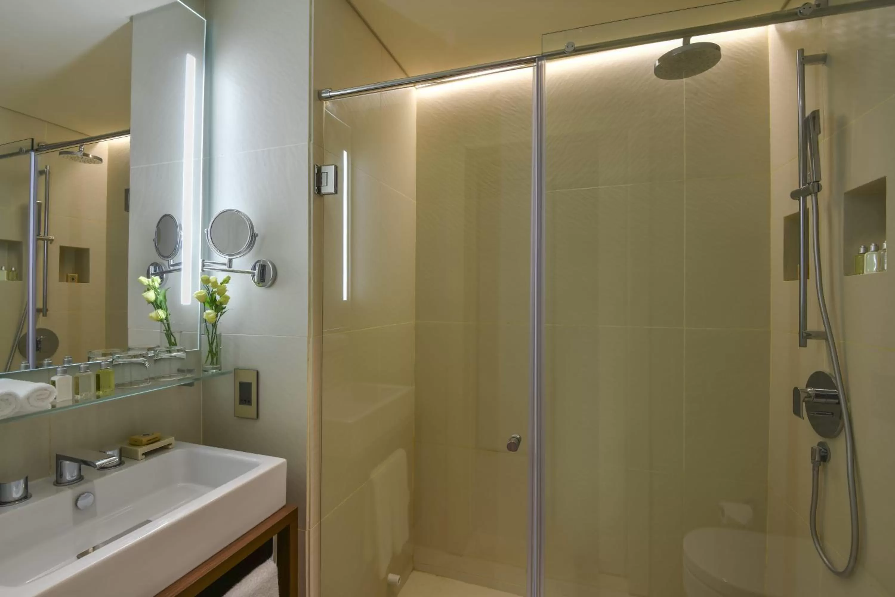 Bathroom in voco Doha West Bay Suites by IHG