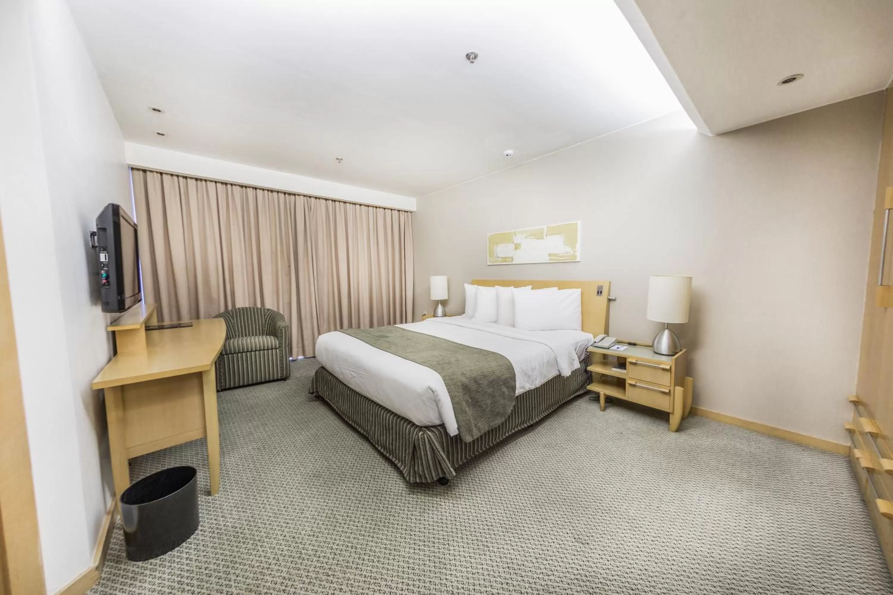 Bed in Grand Bittar Hotel