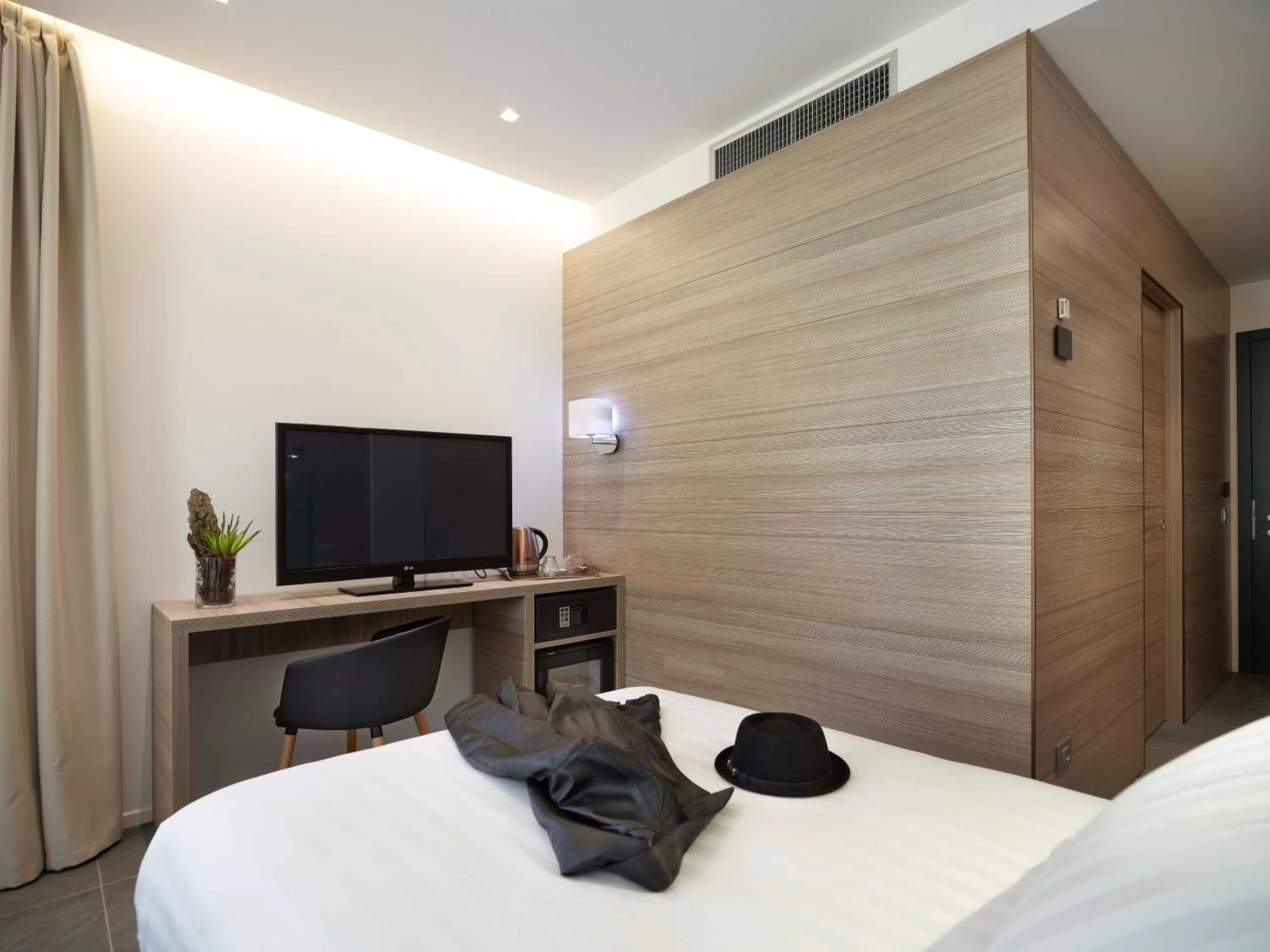 Bed in Boutique Hotel Touring