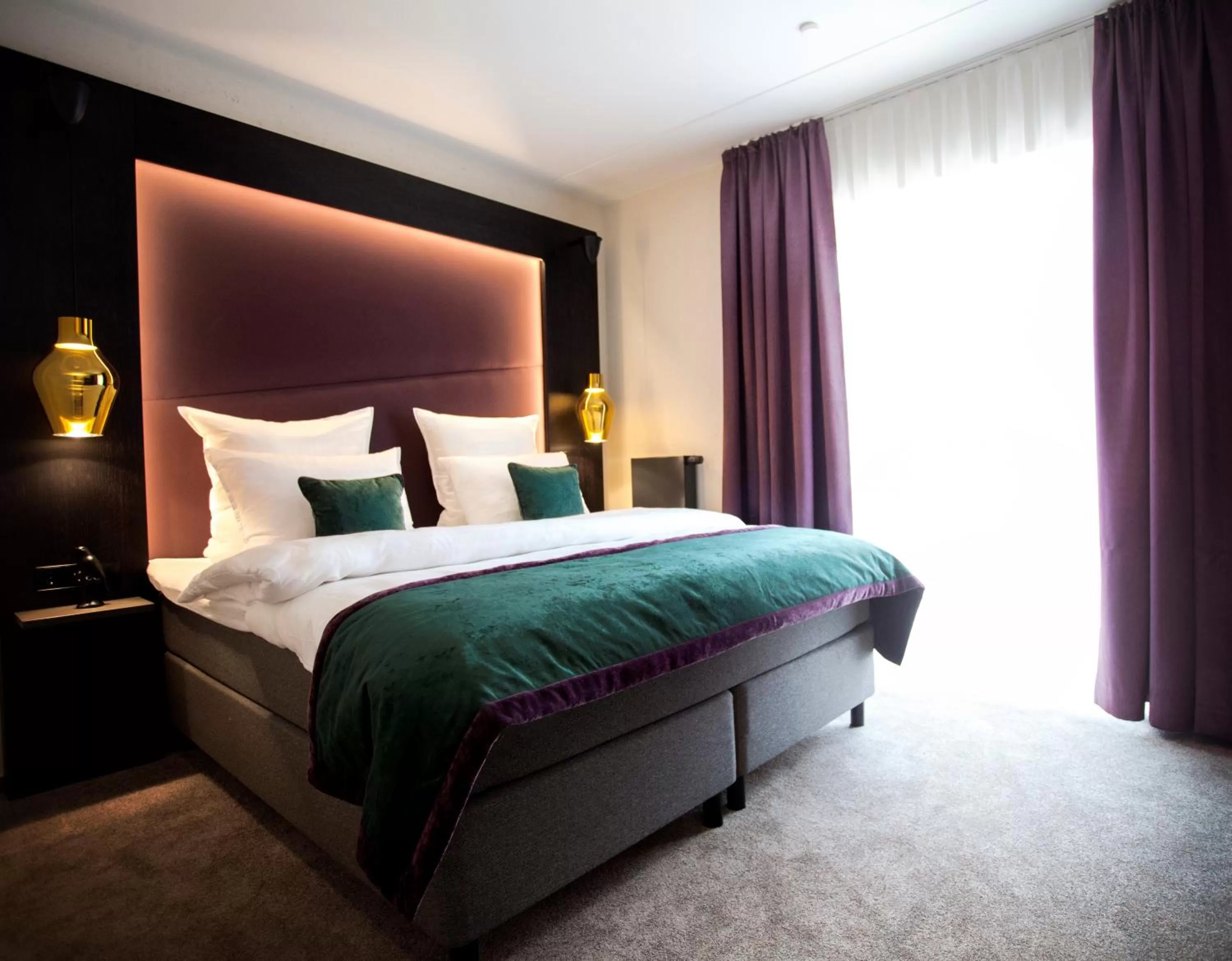 Bed in ONNO Boutique Hotel & Apartments