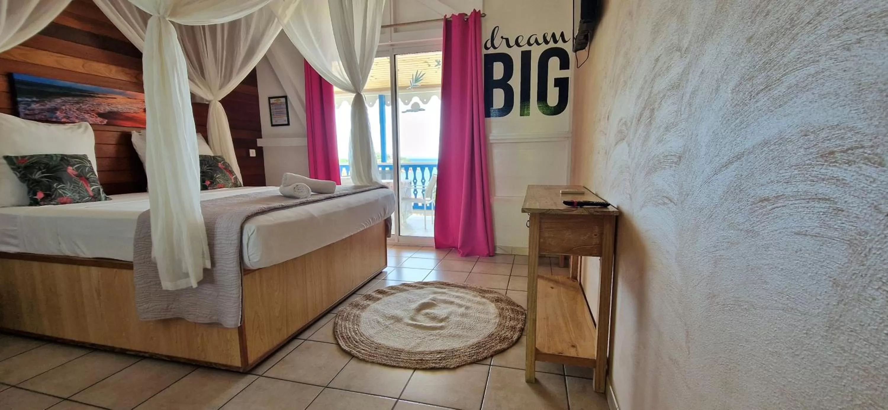 Bed in Hotel Le Manguier