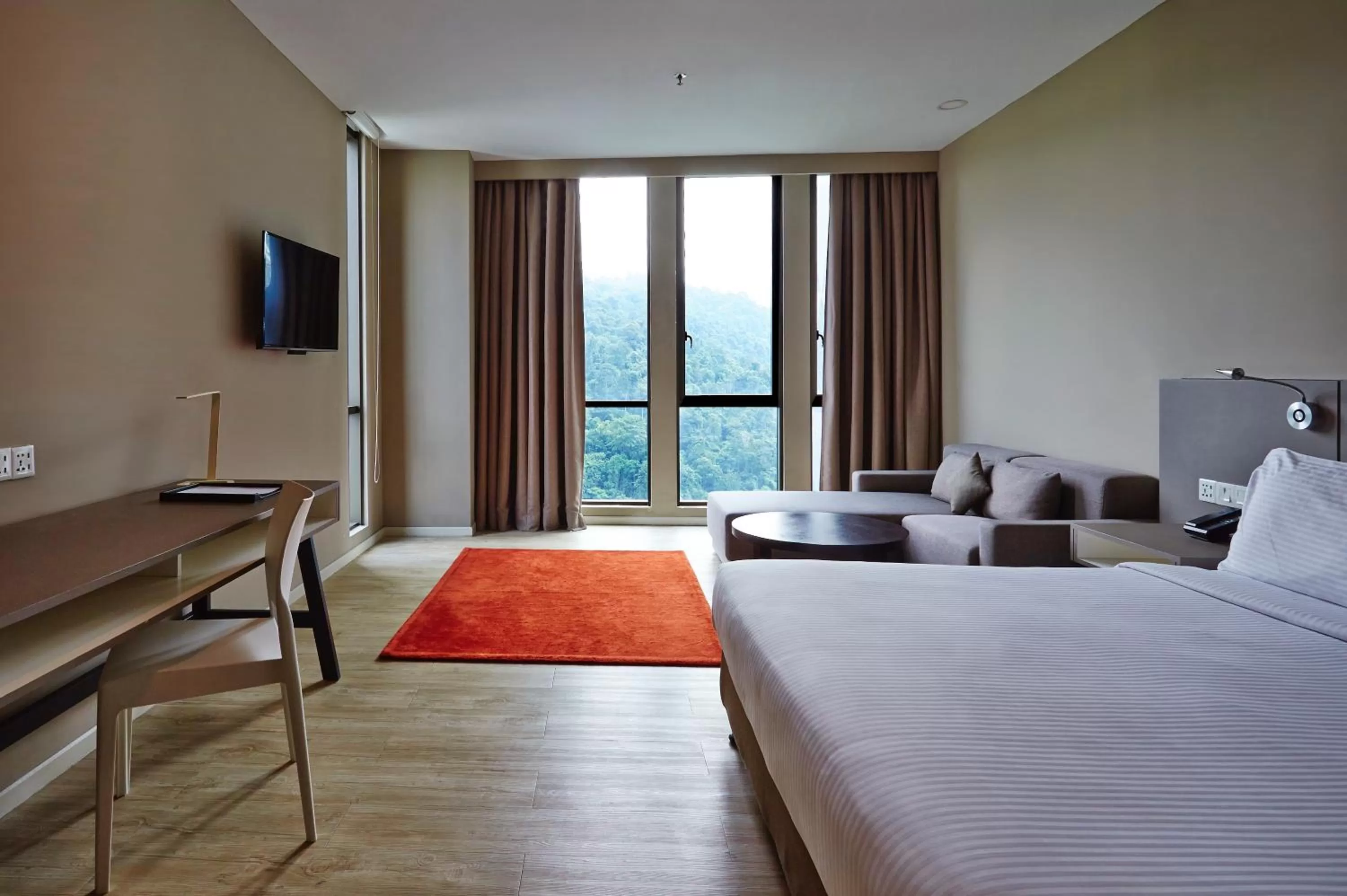 Bed in Qliq Damansara Hotel