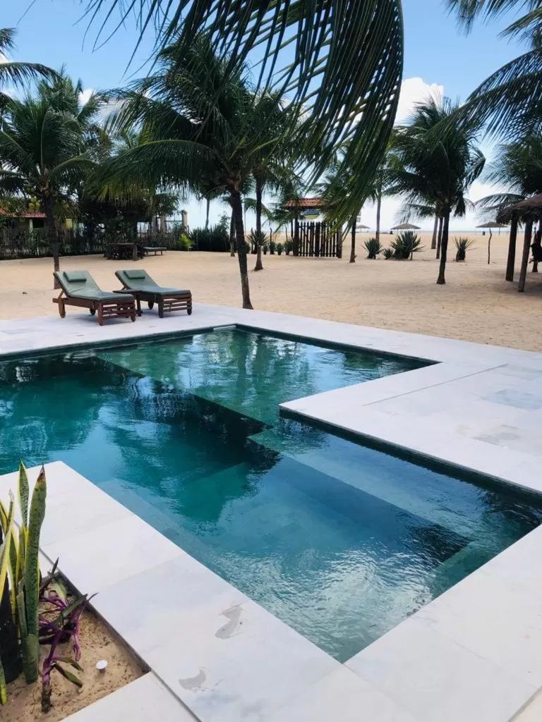 Swimming Pool in Pousada Recanto da Praia