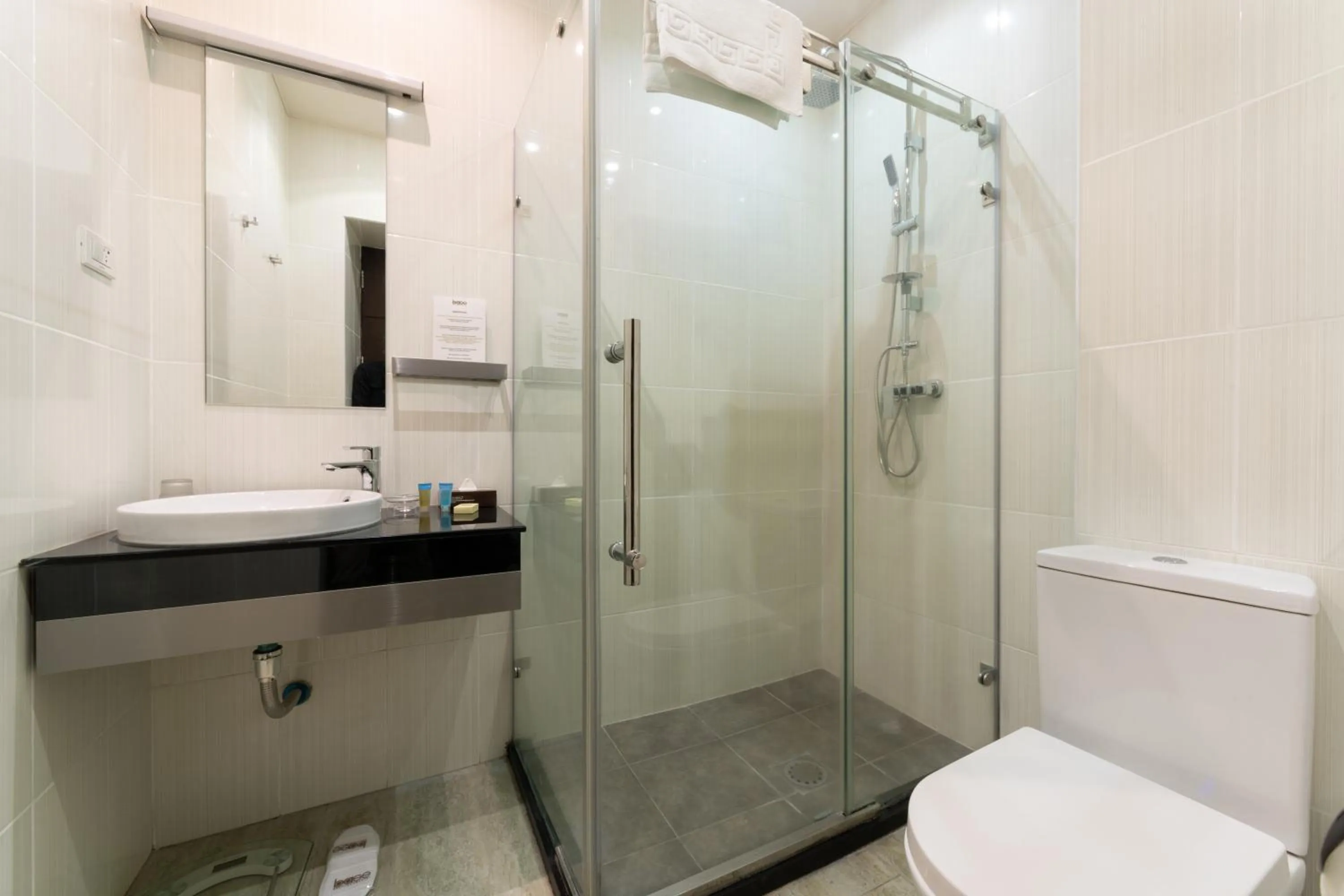 Toilet in Bass Boutique Hotel