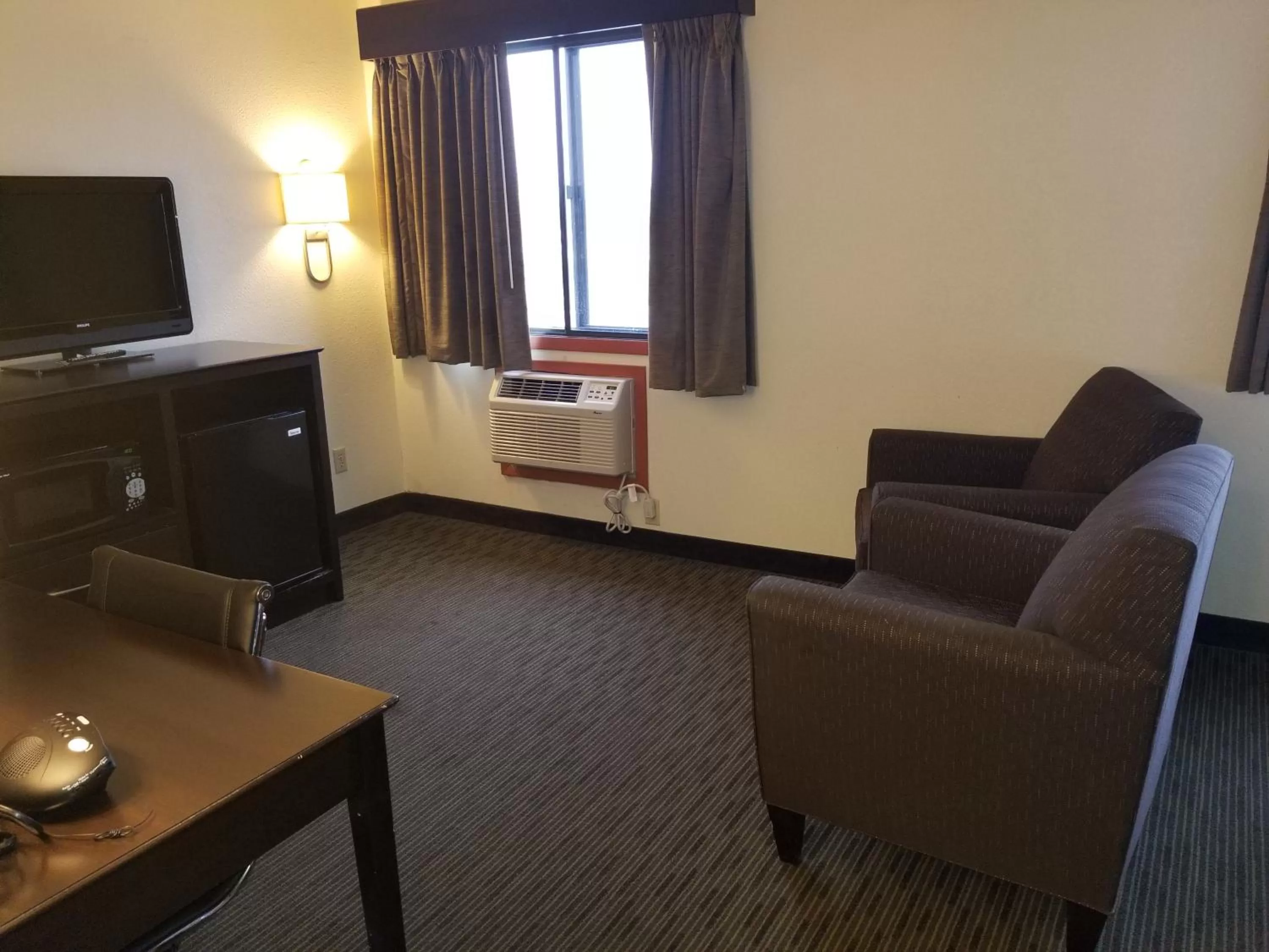 Living room in Baymont by Wyndham Eau Claire WI