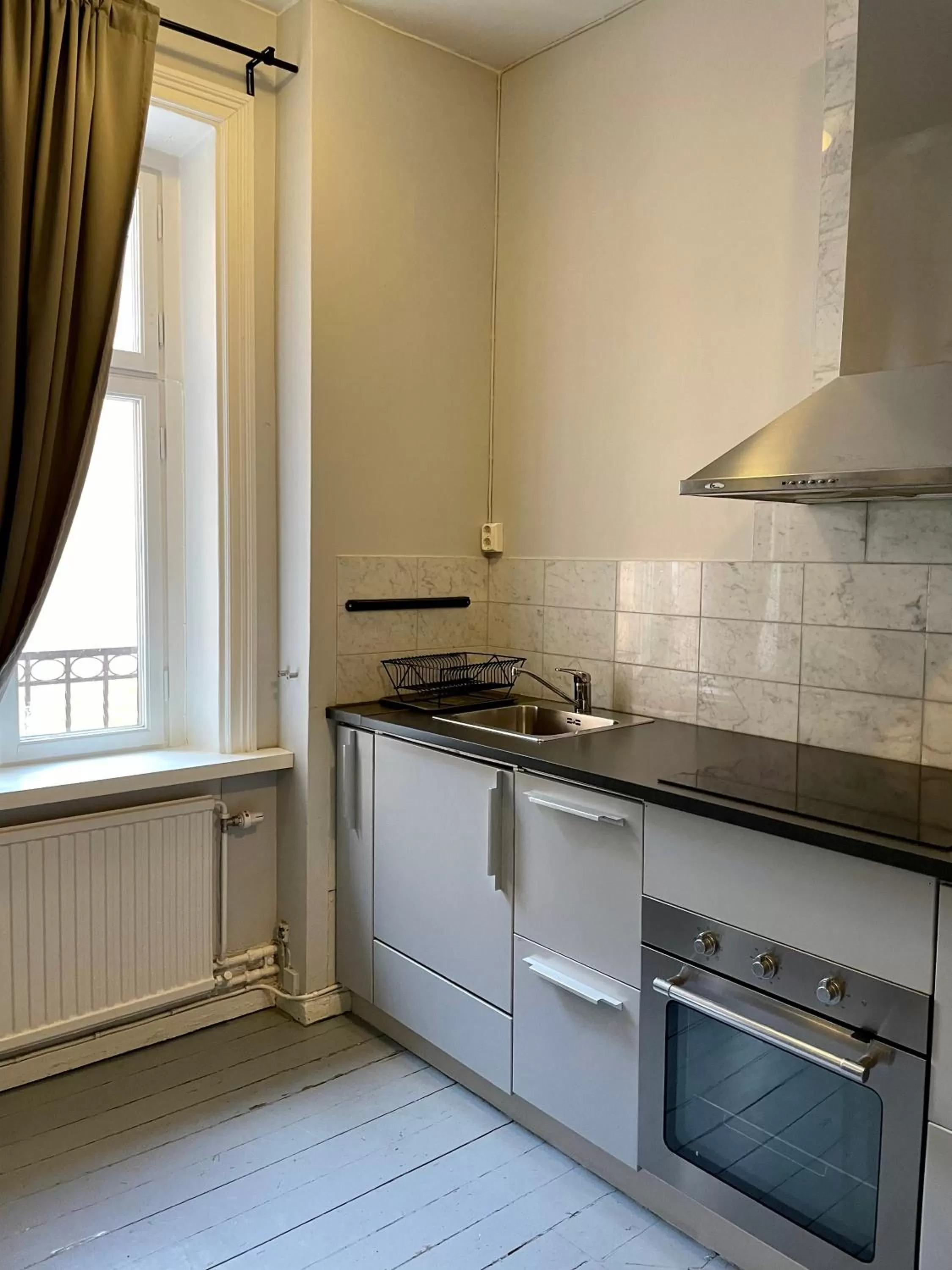 Kitchen or kitchenette in Unique Hotel