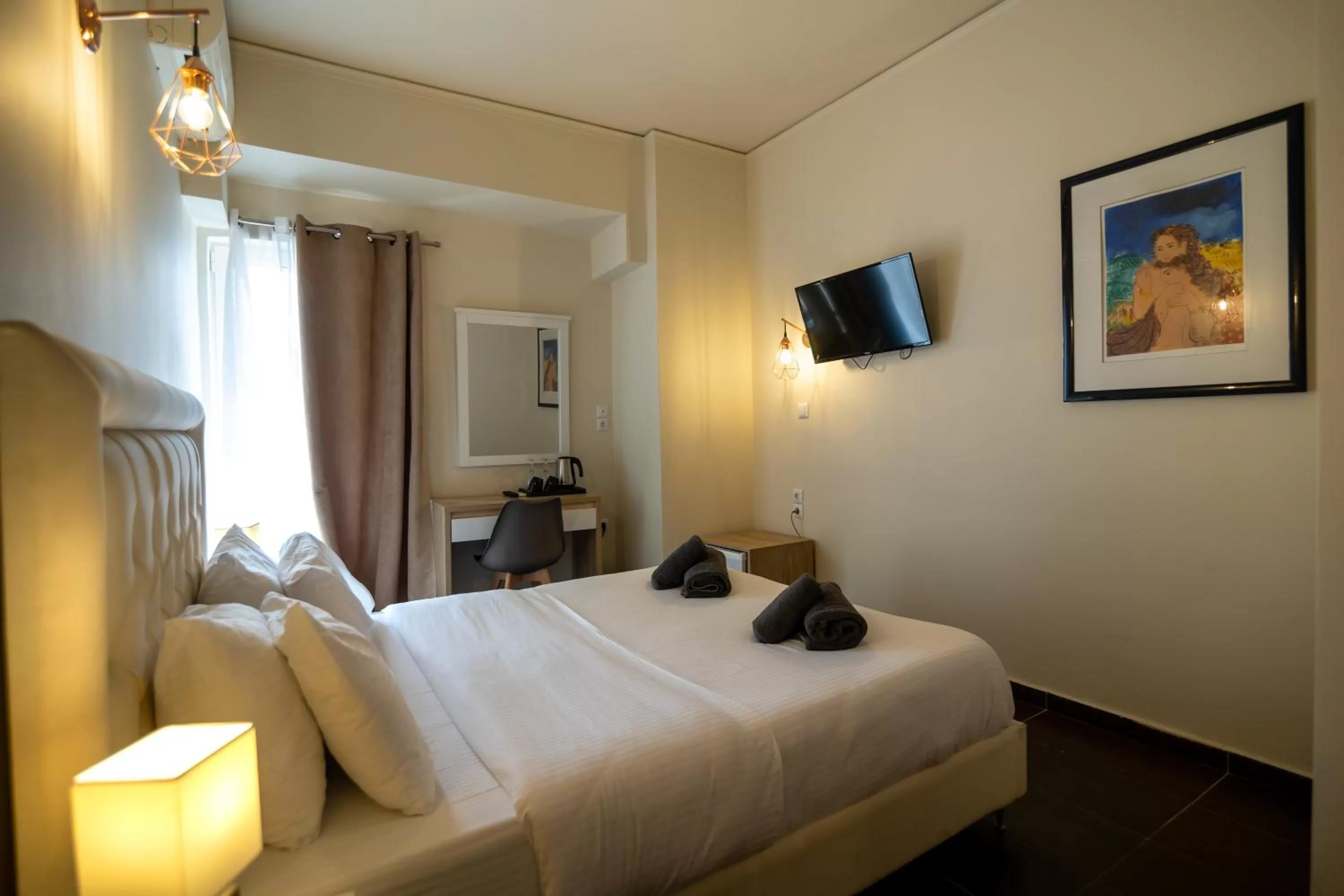 Bed in Votsalakia Hotel & Luxury Apartments