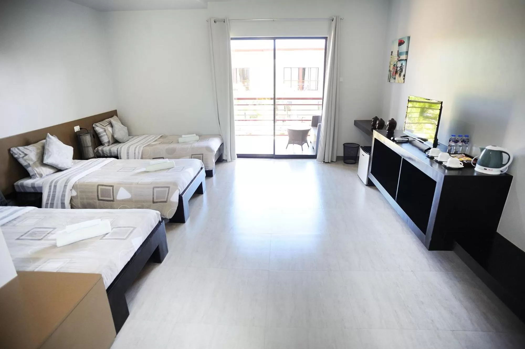 Photo of the whole room, Bed in Tamarind