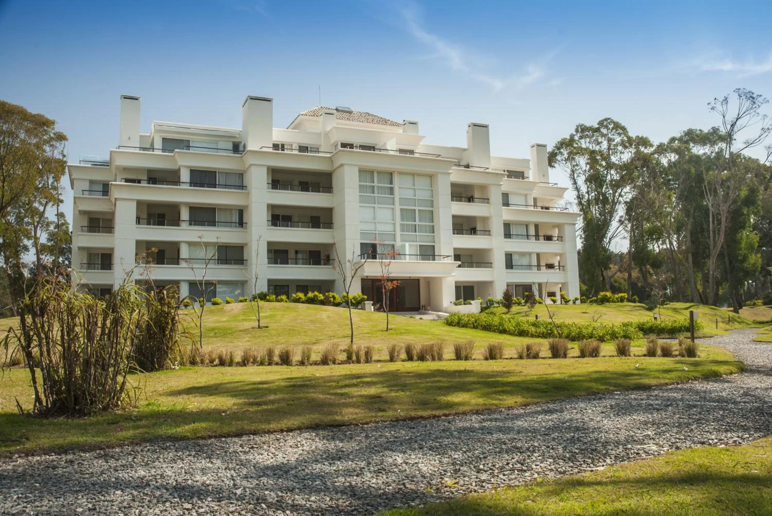 Property building, Garden in Solanas Green Park Spa & Resort