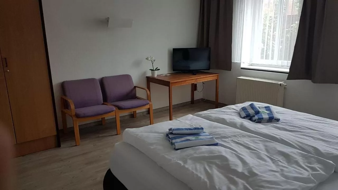 Bed in Appartement-Hotel Rostock