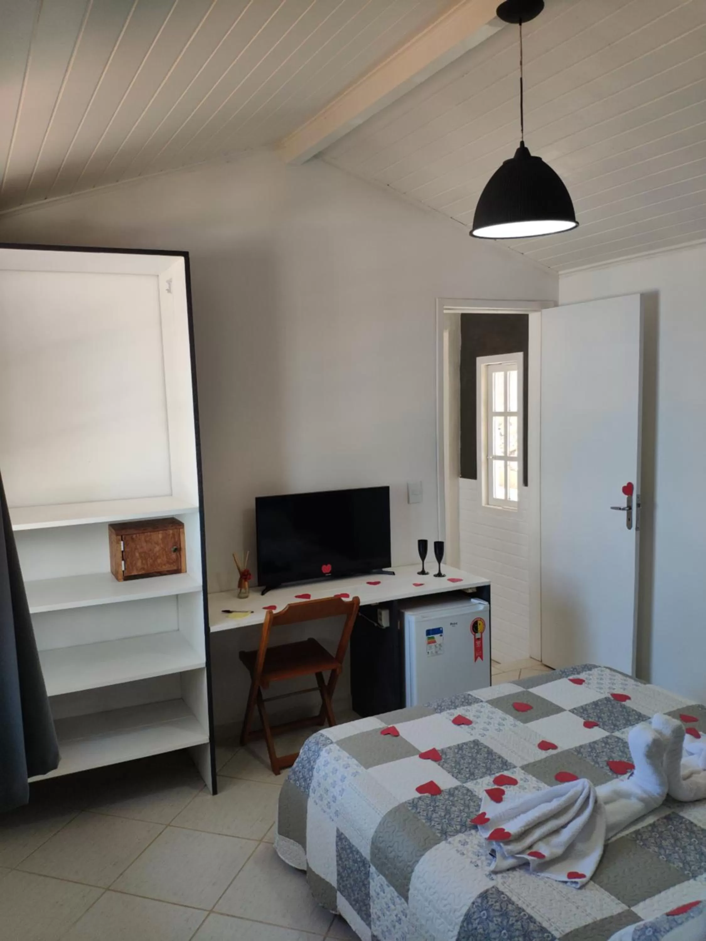 TV/Entertainment Center in Casa de Hóspedes "Guesthouse Prainha"