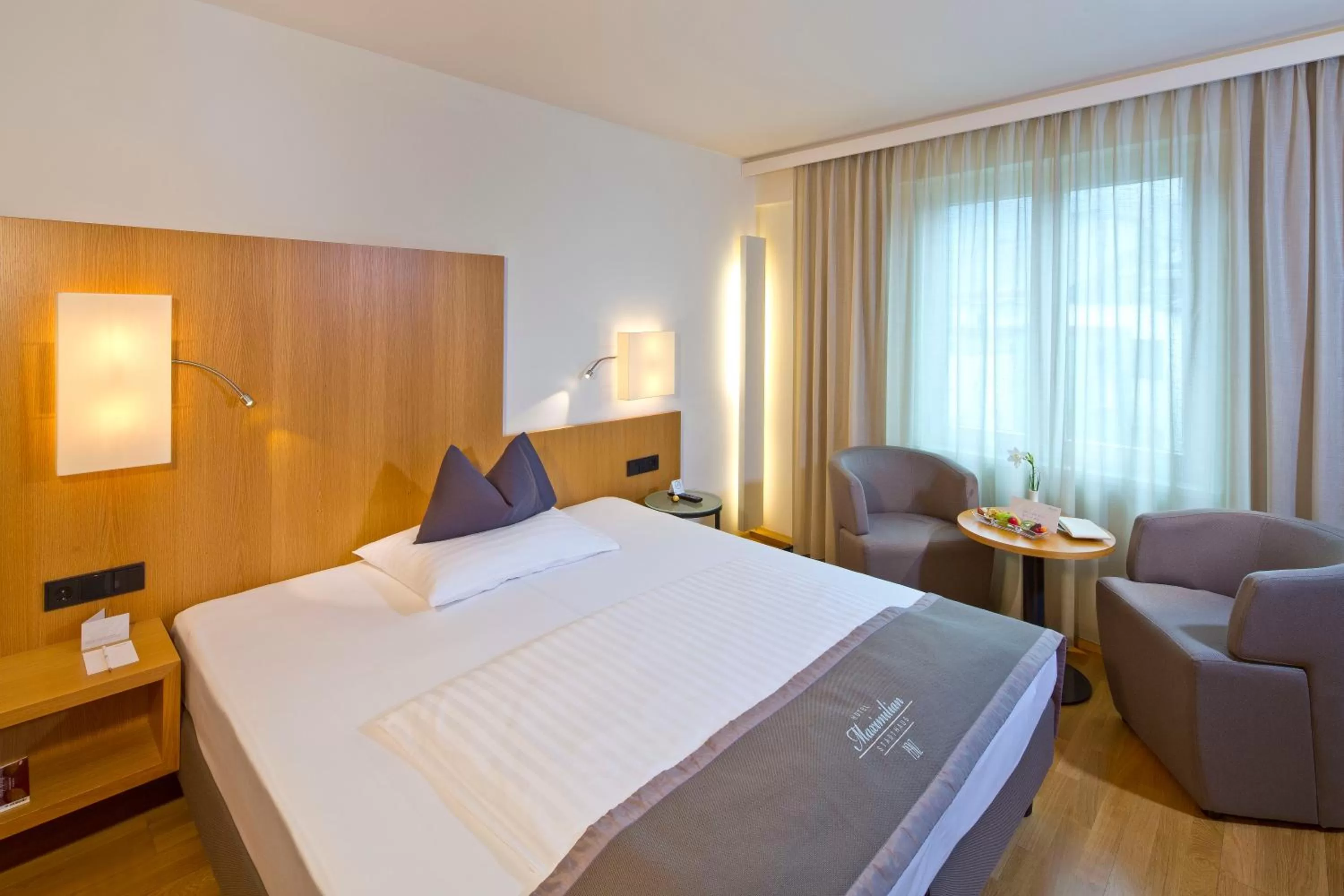 Photo of the whole room, Bed in Hotel Maximilian - Stadthaus Penz