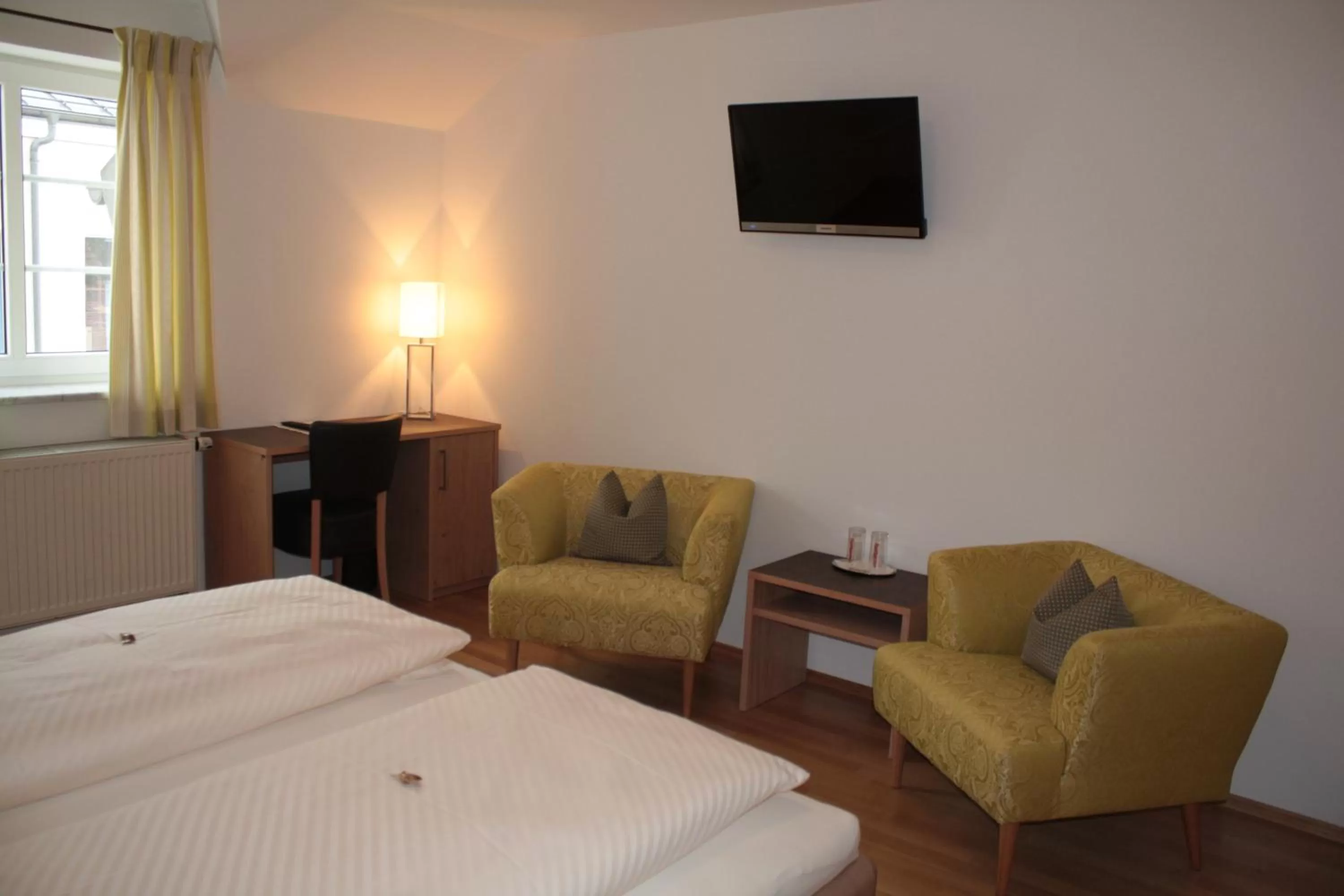 Photo of the whole room, TV/Entertainment Center in Bäckerei Konditorei Frühstückspension WAGNER