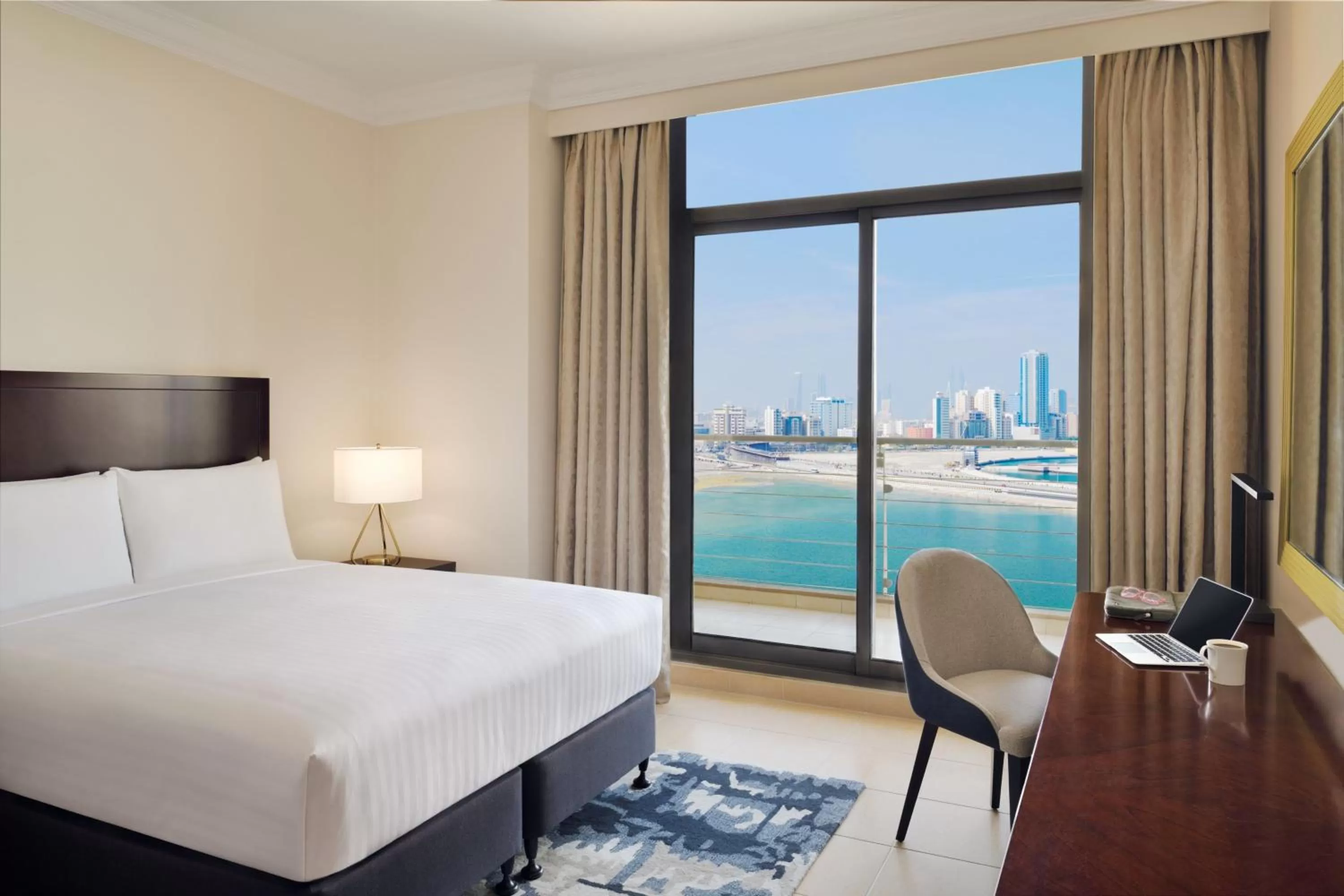 Photo of the whole room, Bed in Marriott Executive Apartments Manama, Bahrain