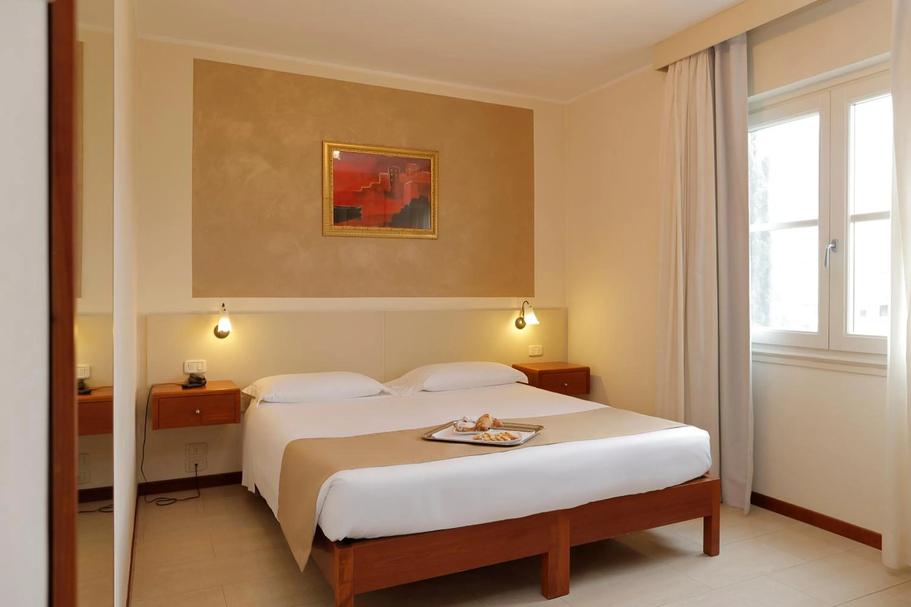 Bed in Hotel Michelangelo