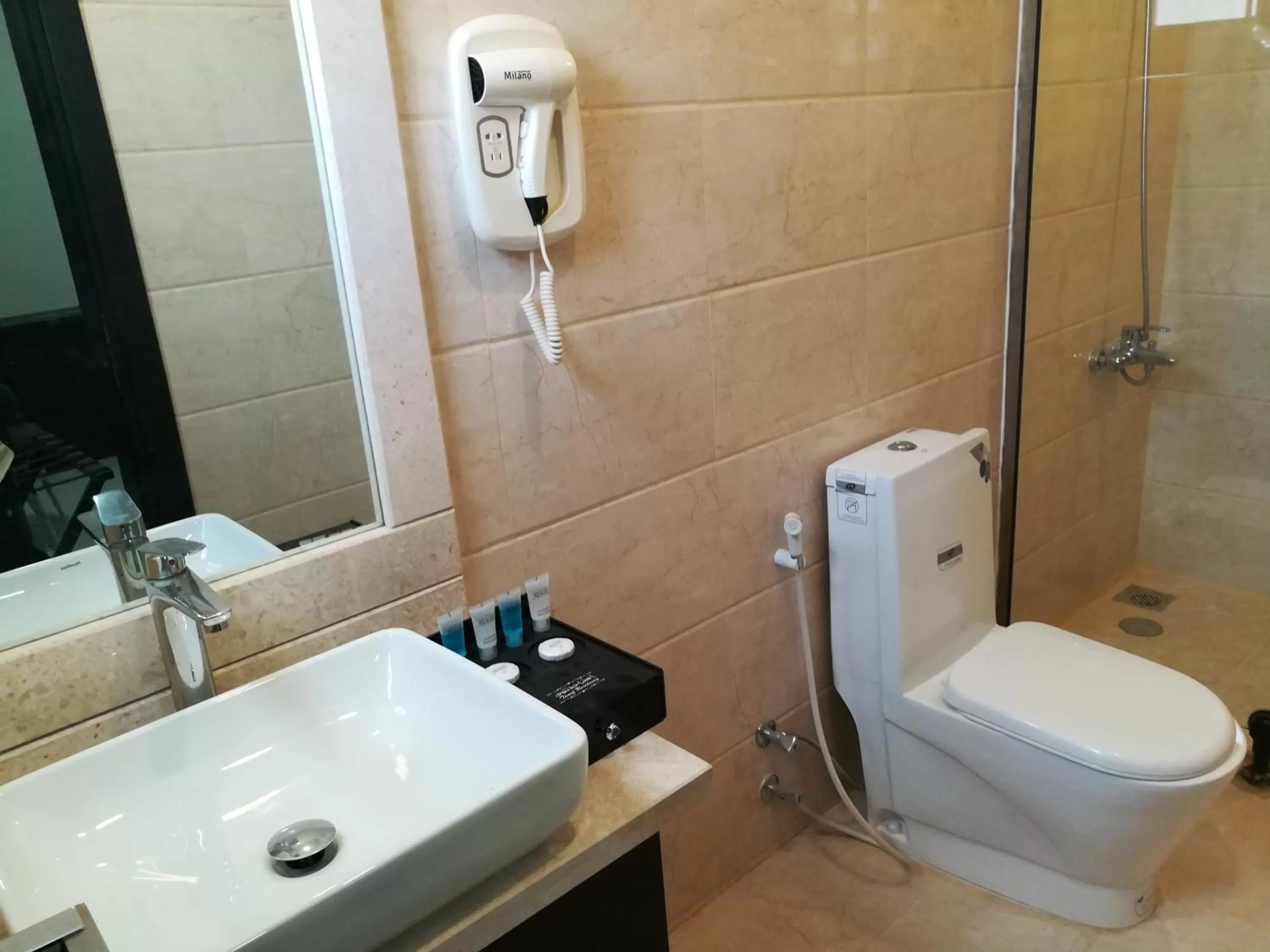 Bathroom in Tanuf Residency Hotel