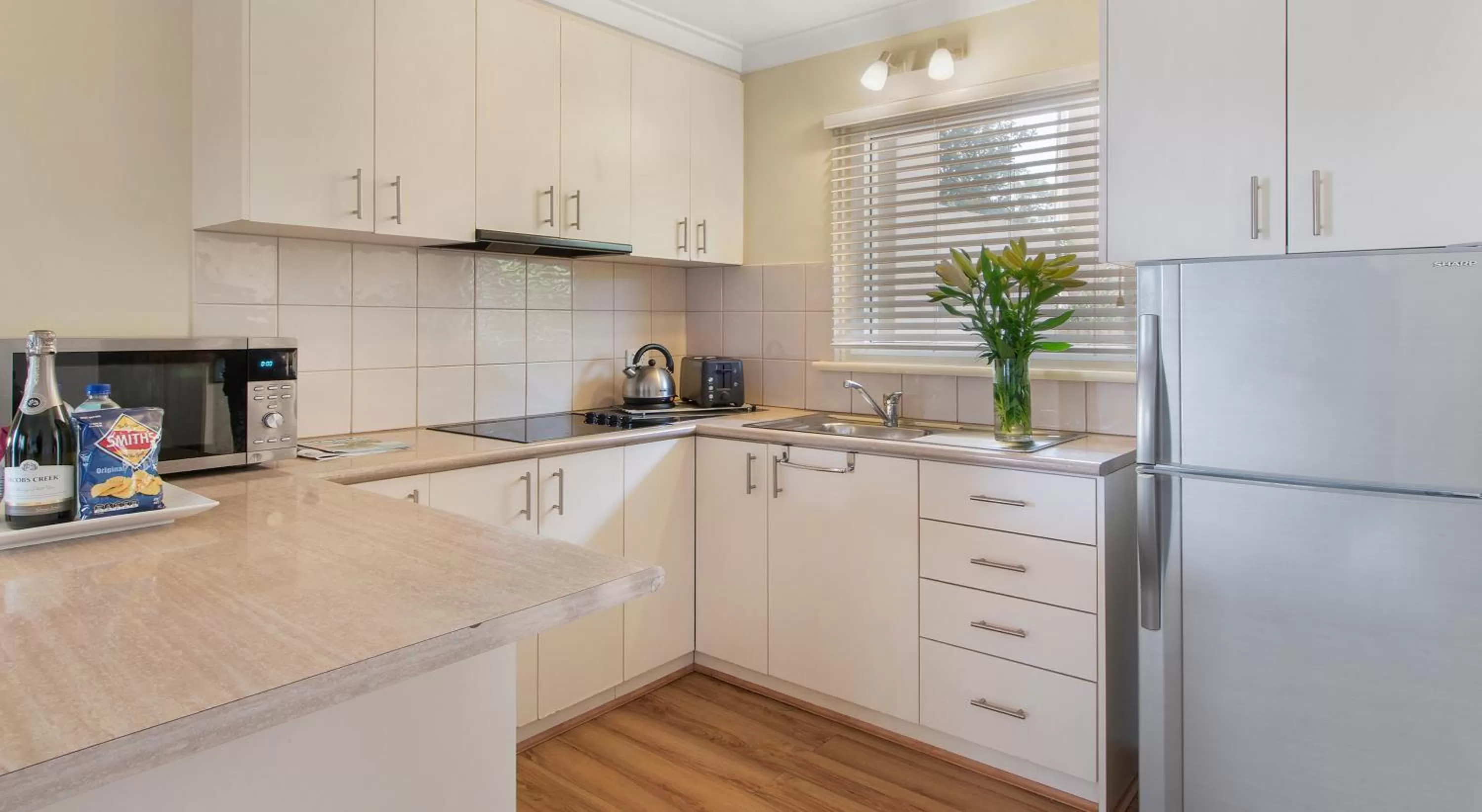 Kitchen or kitchenette in The Peninsula Riverside Serviced Apartments