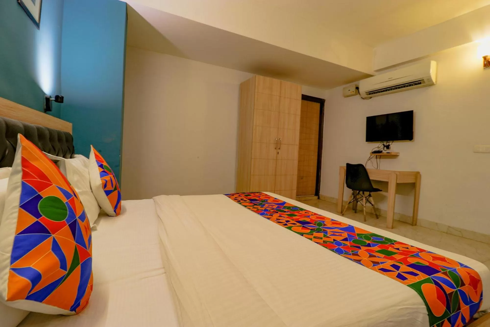 Bed in FabHotel Happy Inn