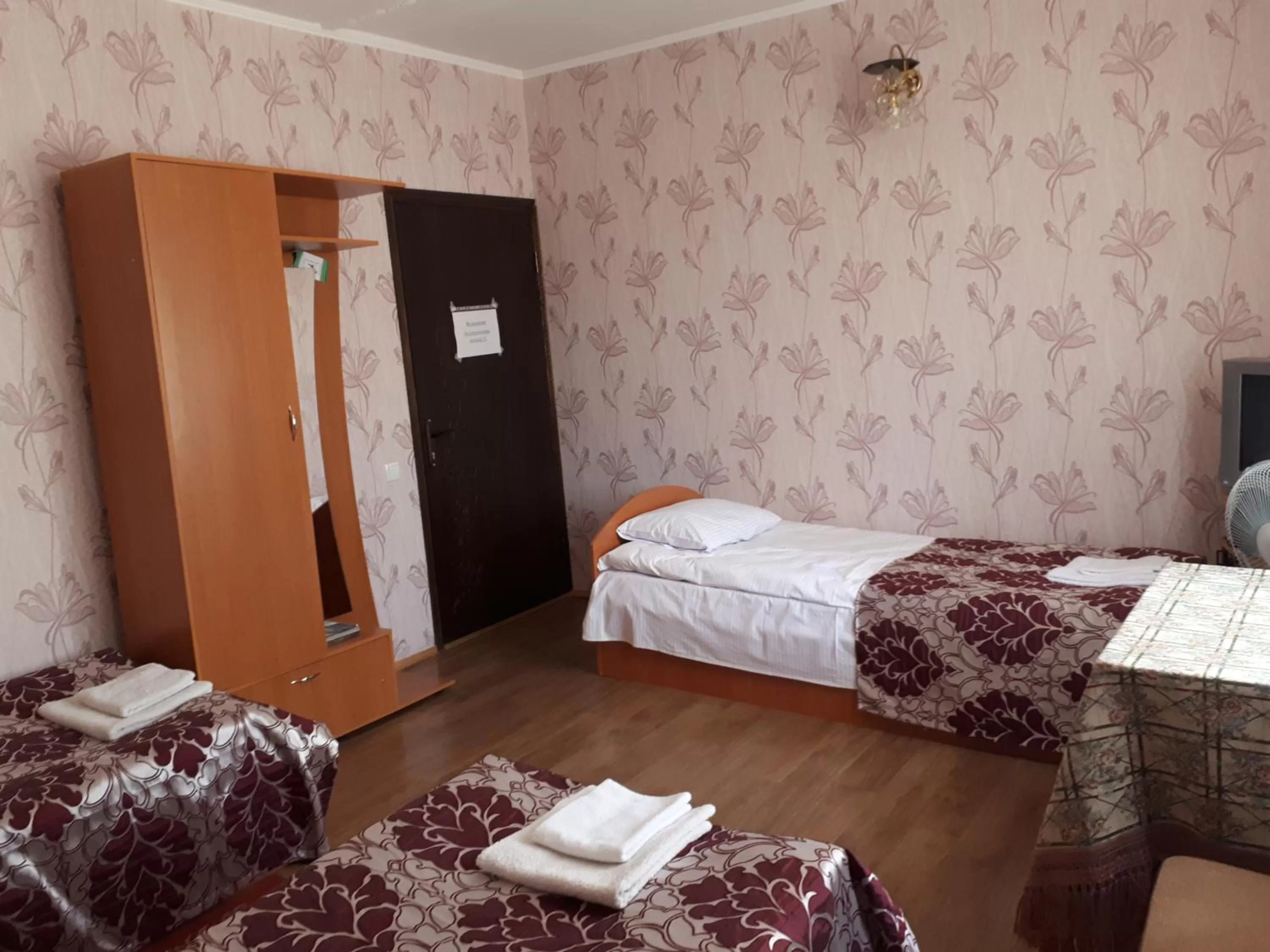 Bed in Hotel Gostynnyi Dvir