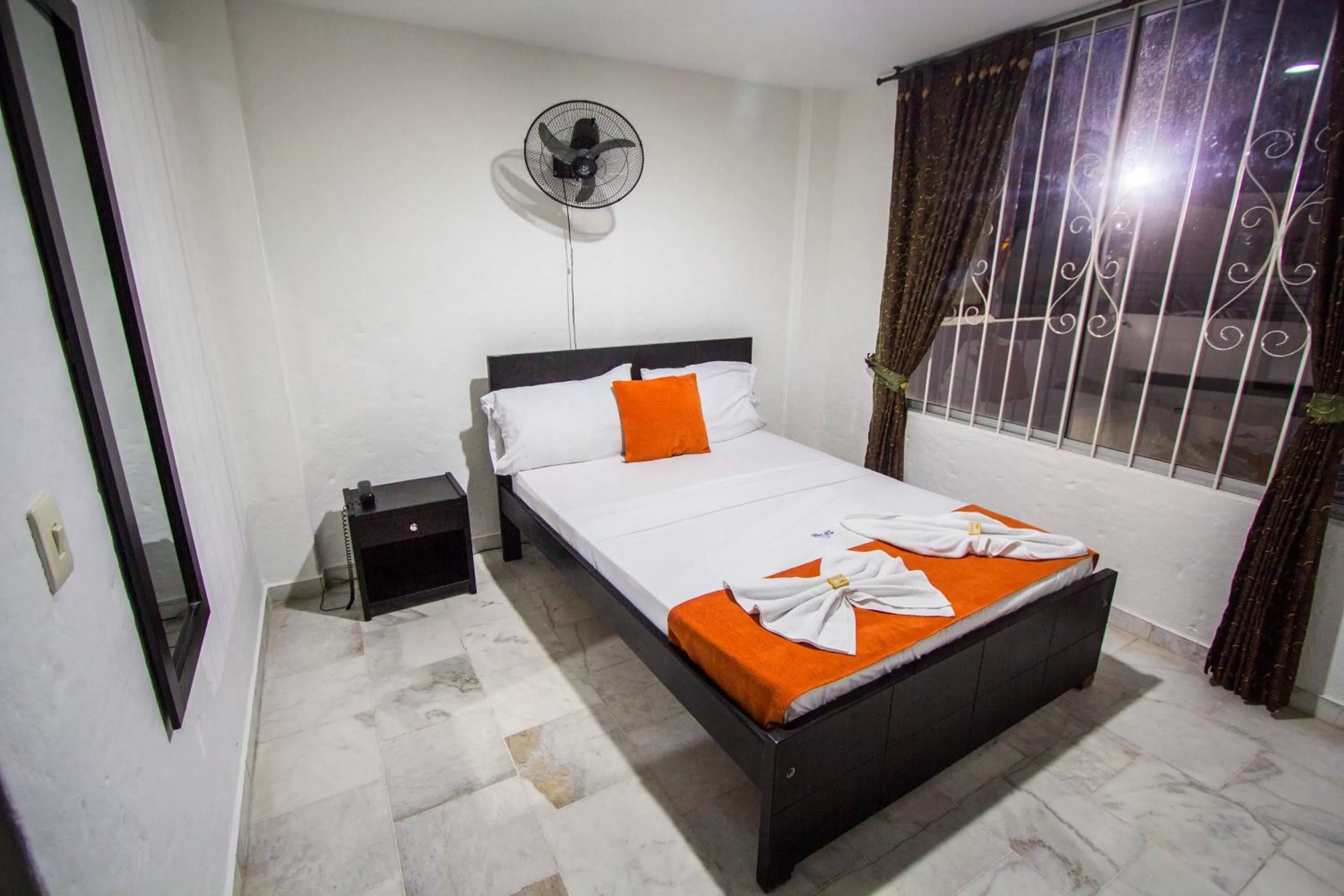 Bed in Blue Star Hotel