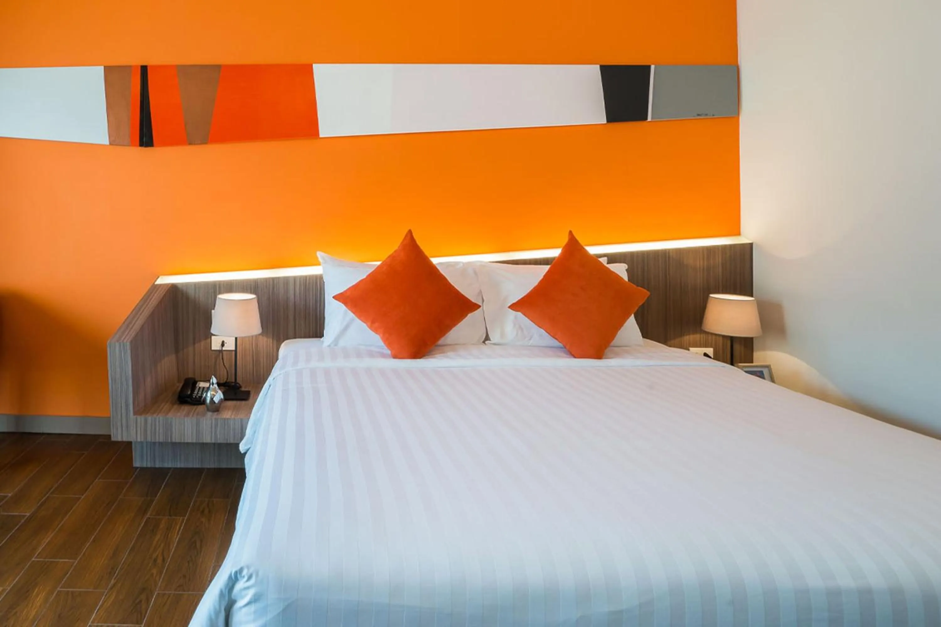 Bed in J Inspired Hotel Pattaya