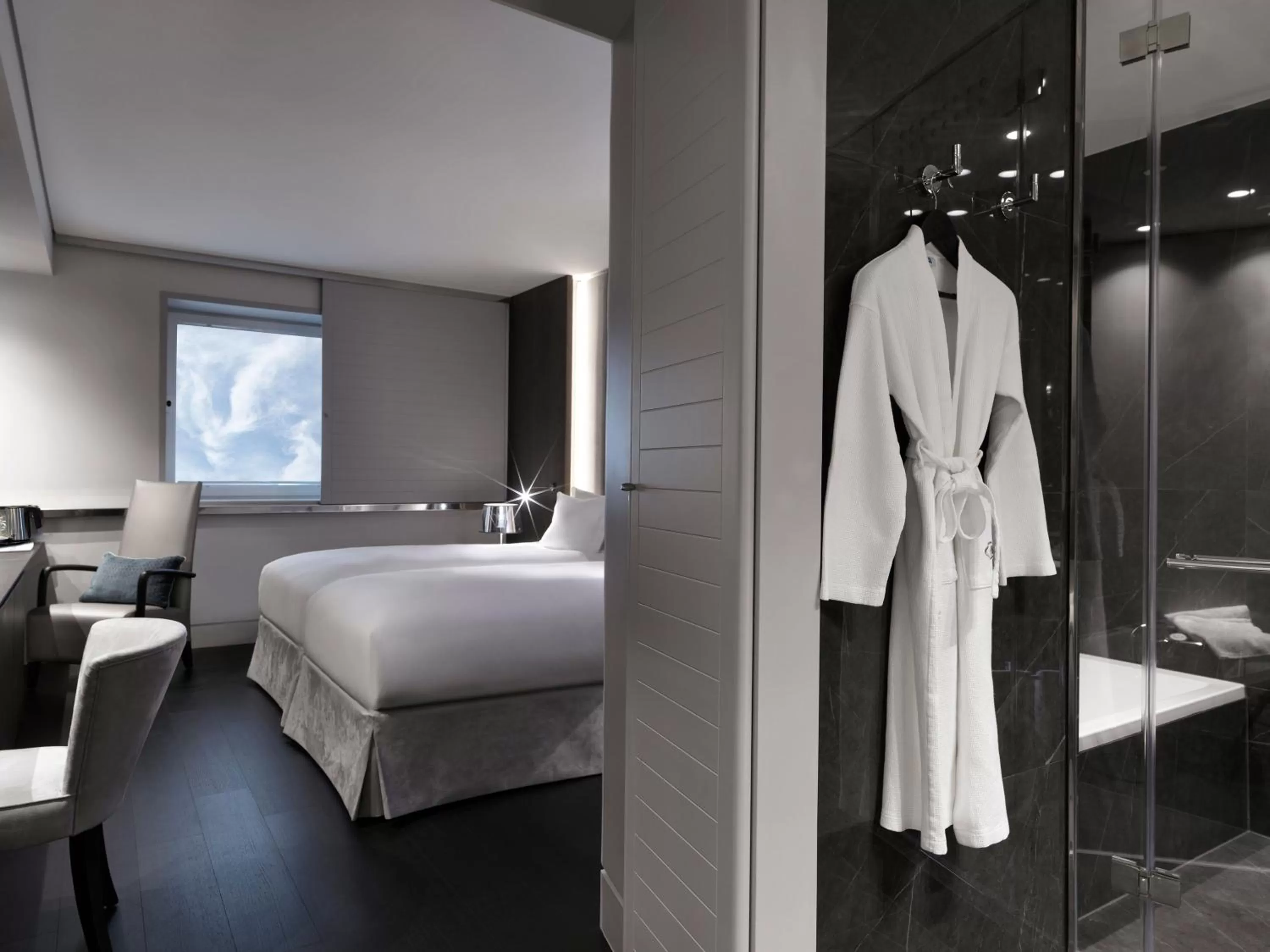 Photo of the whole room, Bed in Sofitel Athens Airport