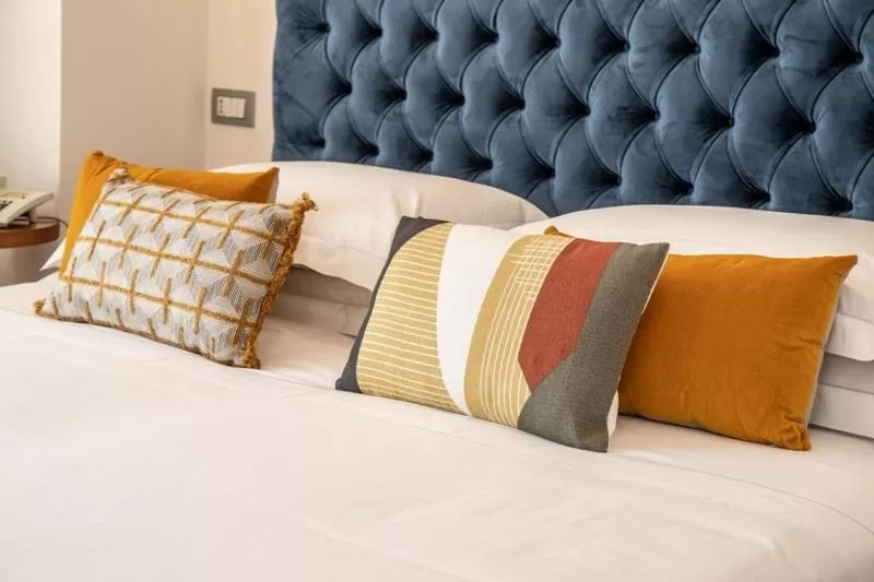 Bed in Dal Moro Gallery Hotel