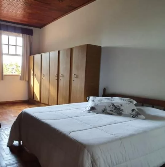 Bed in Apart Hotel Flomon