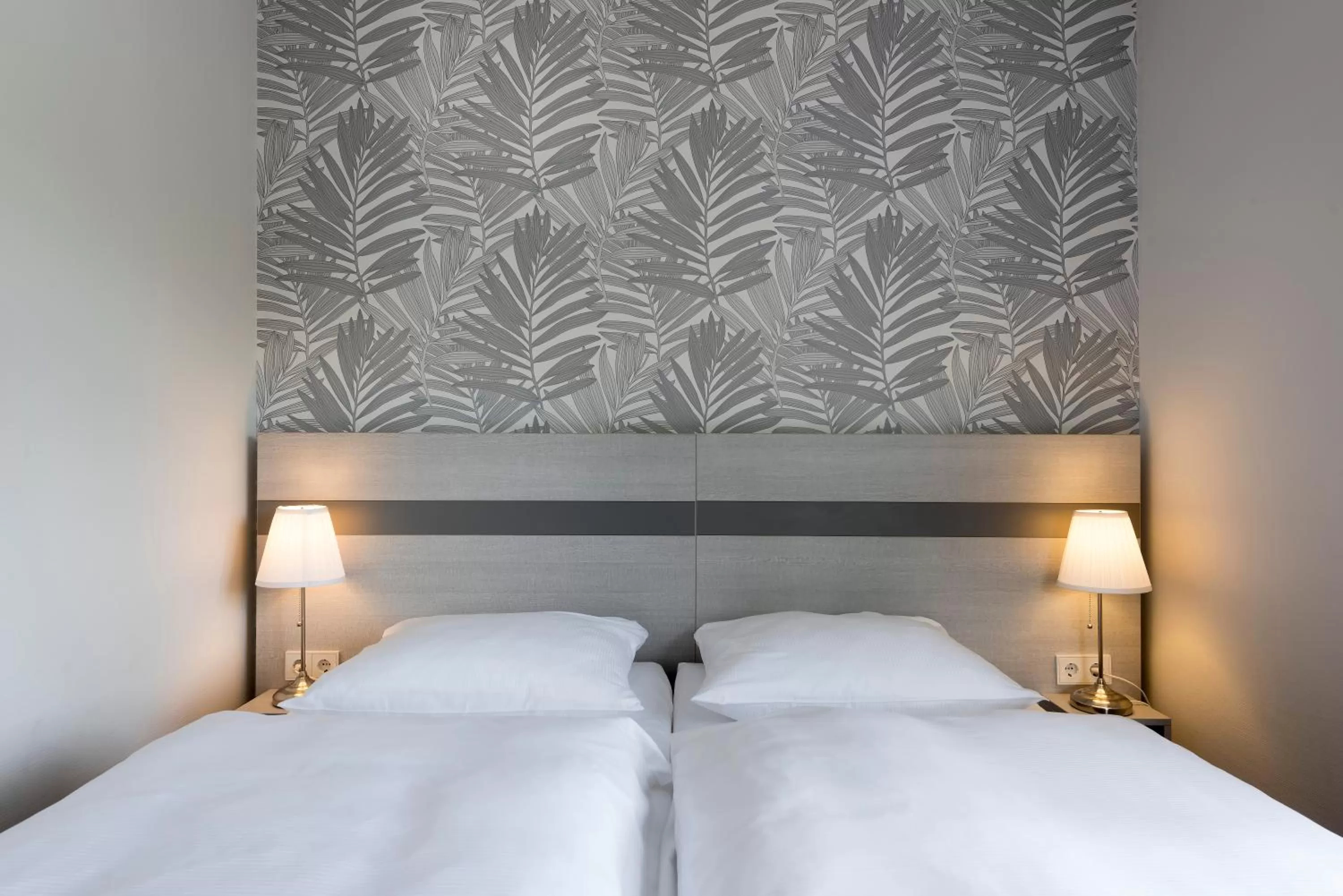 Bed in Hotel des Nordens Flensburg Wellness & Spa