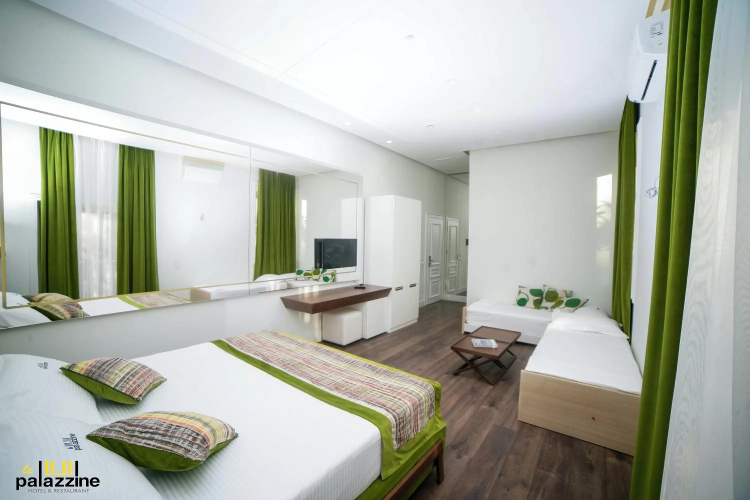 Bed in Le Palazzine Hotel