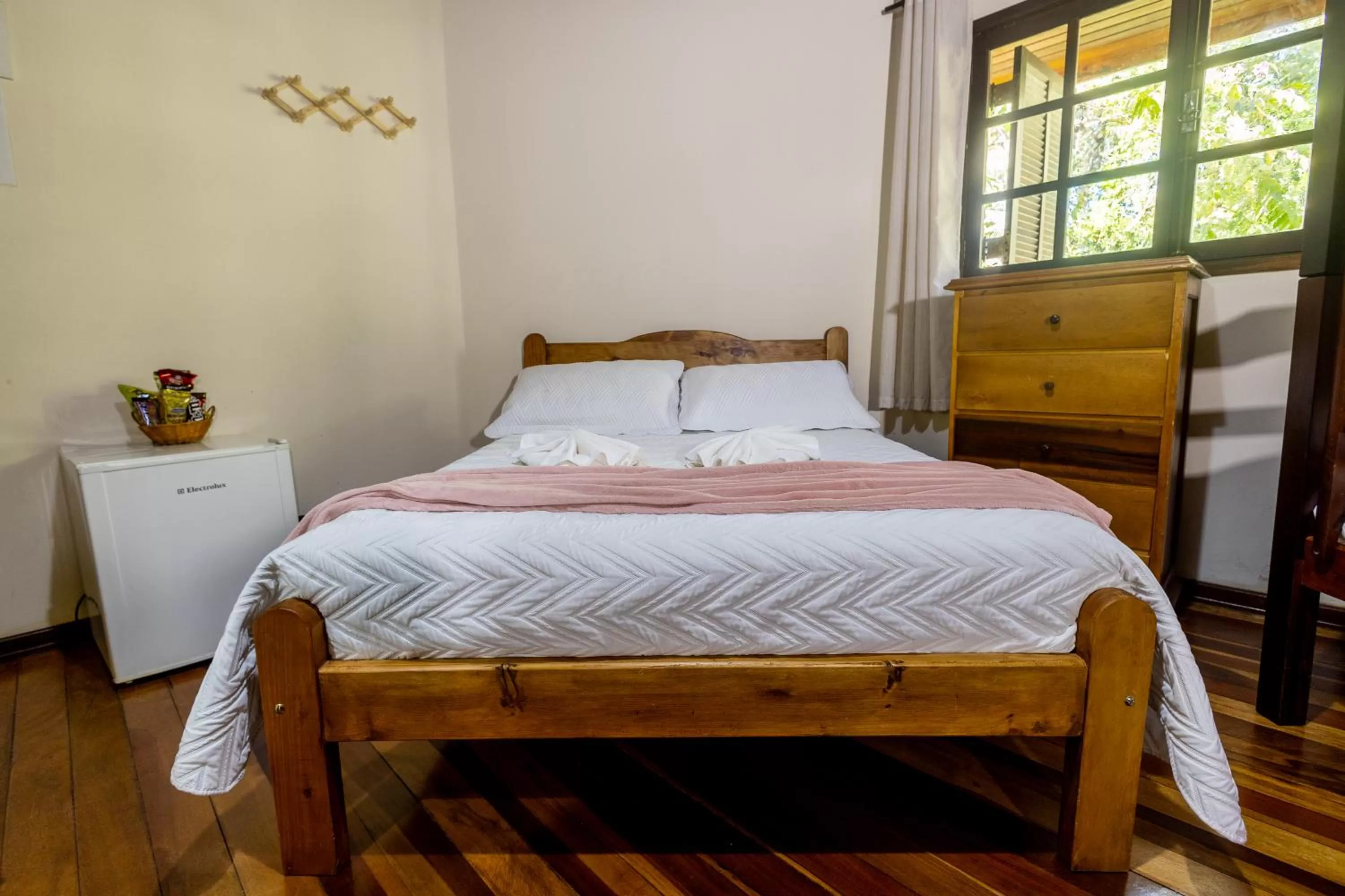 Bed in Chalés 3 Pinheiros